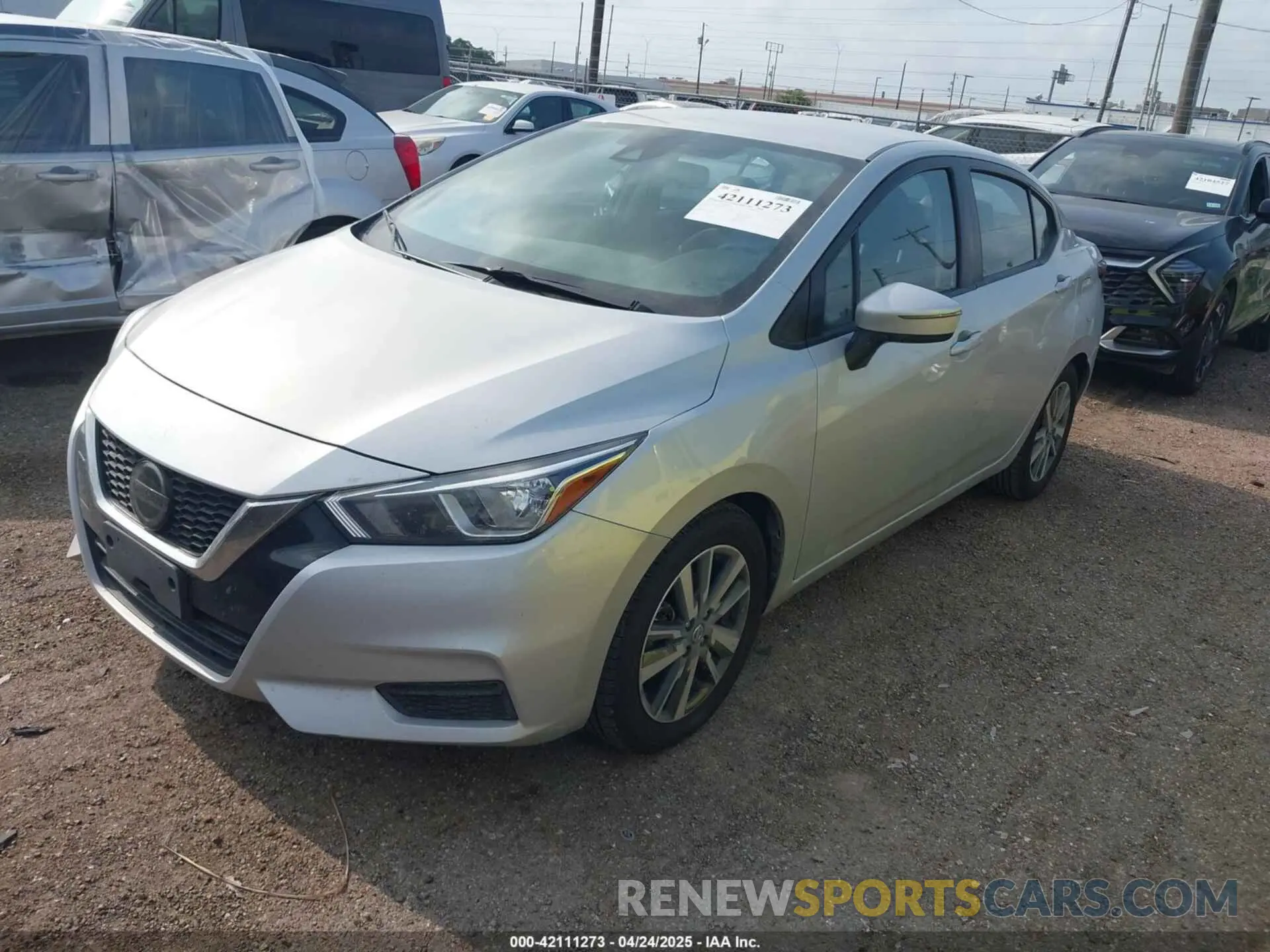 2 fotografías del automóvil dañado 3N1CN8EV8ML853517 NISSAN VERSA 2021