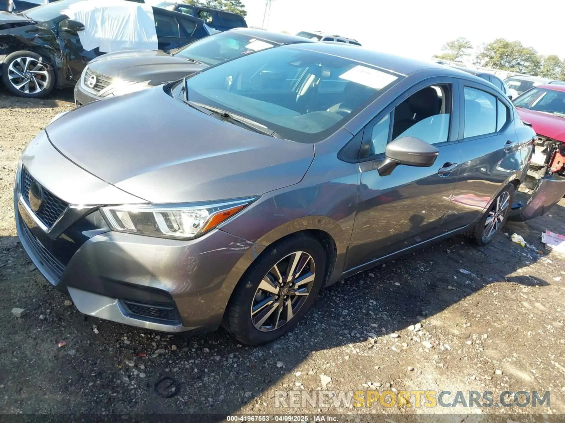 2 fotografías del automóvil dañado 3N1CN8EVXML845578 NISSAN VERSA 2021