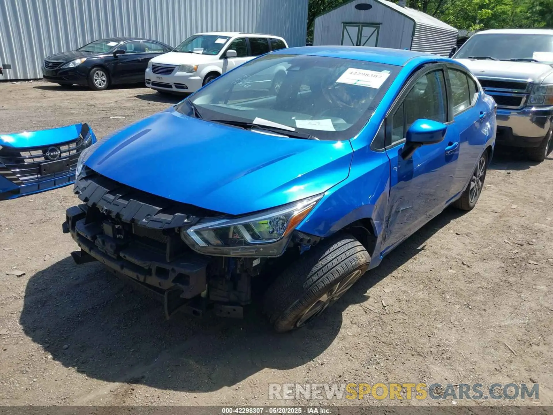2 fotografías del automóvil dañado 3N1CN8EV0PL862720 NISSAN VERSA 2023