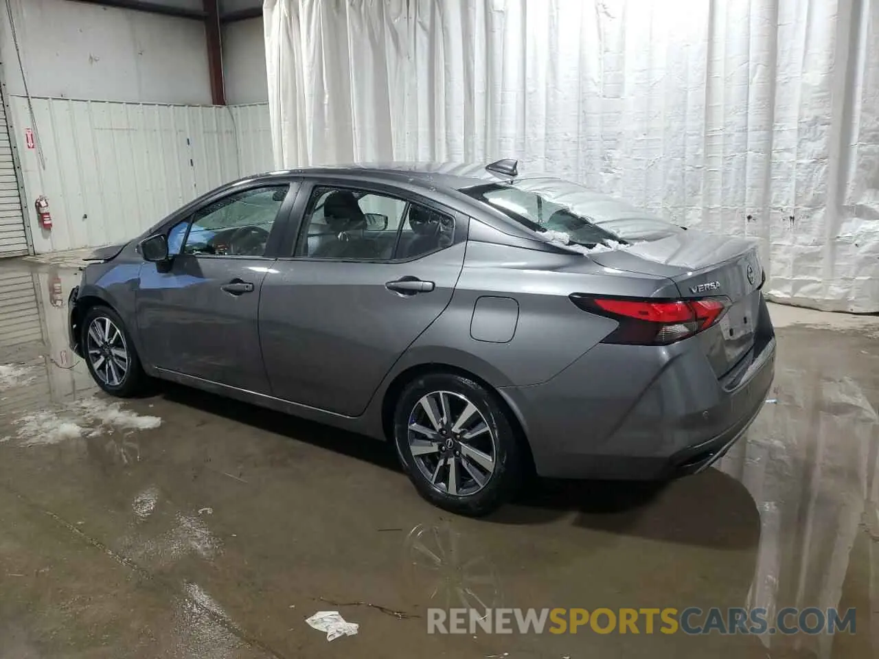 2 fotografías del automóvil dañado 3N1CN8EV0PL864550 NISSAN VERSA 2023