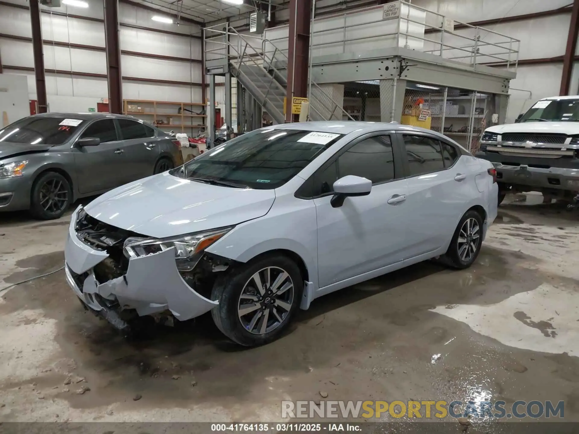 2 fotografías del automóvil dañado 3N1CN8EV2PL868227 NISSAN VERSA 2023
