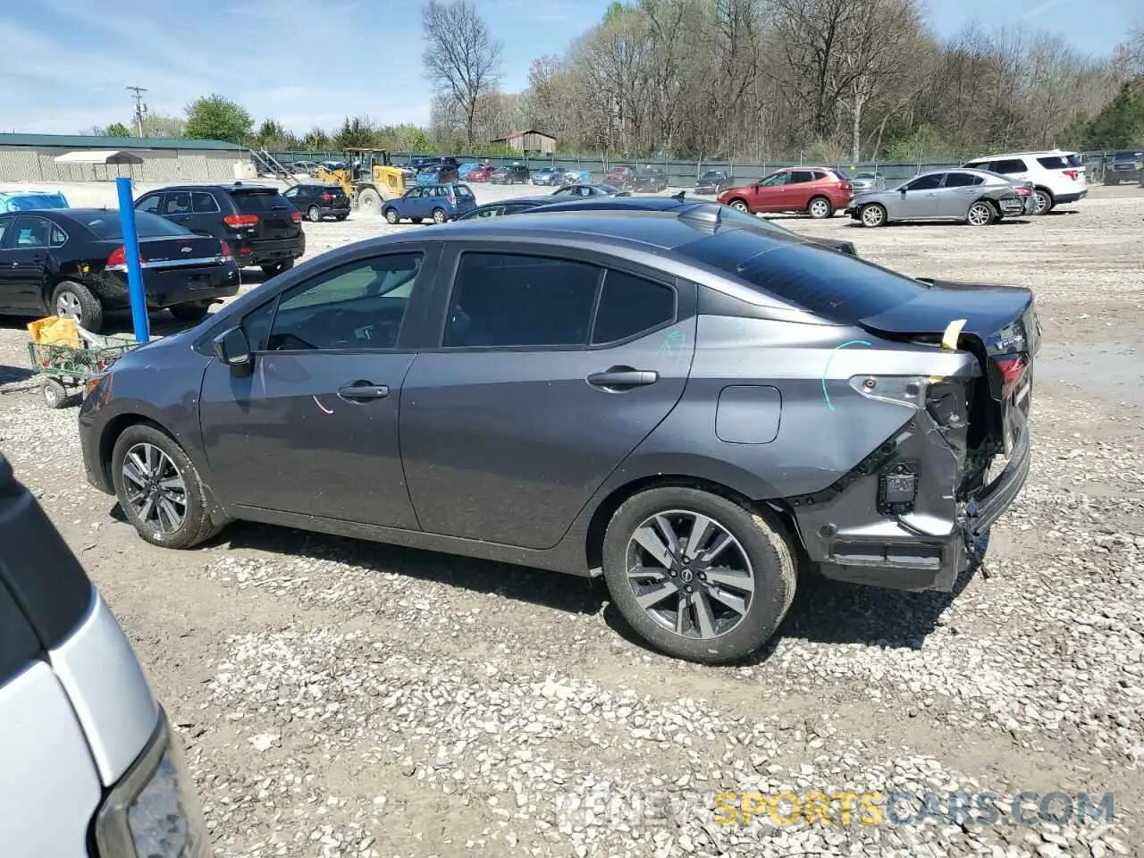 2 fotografías del automóvil dañado 3N1CN8EV2PL870124 NISSAN VERSA 2023