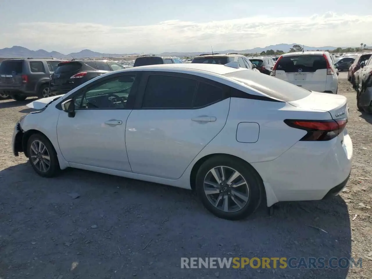 2 fotografías del automóvil dañado 3N1CN8EV5PL874233 NISSAN VERSA 2023