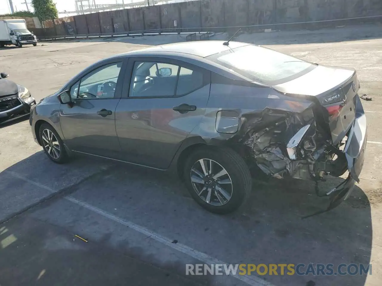 2 fotografías del automóvil dañado 3N1CN8DV0RL910138 NISSAN VERSA 2024