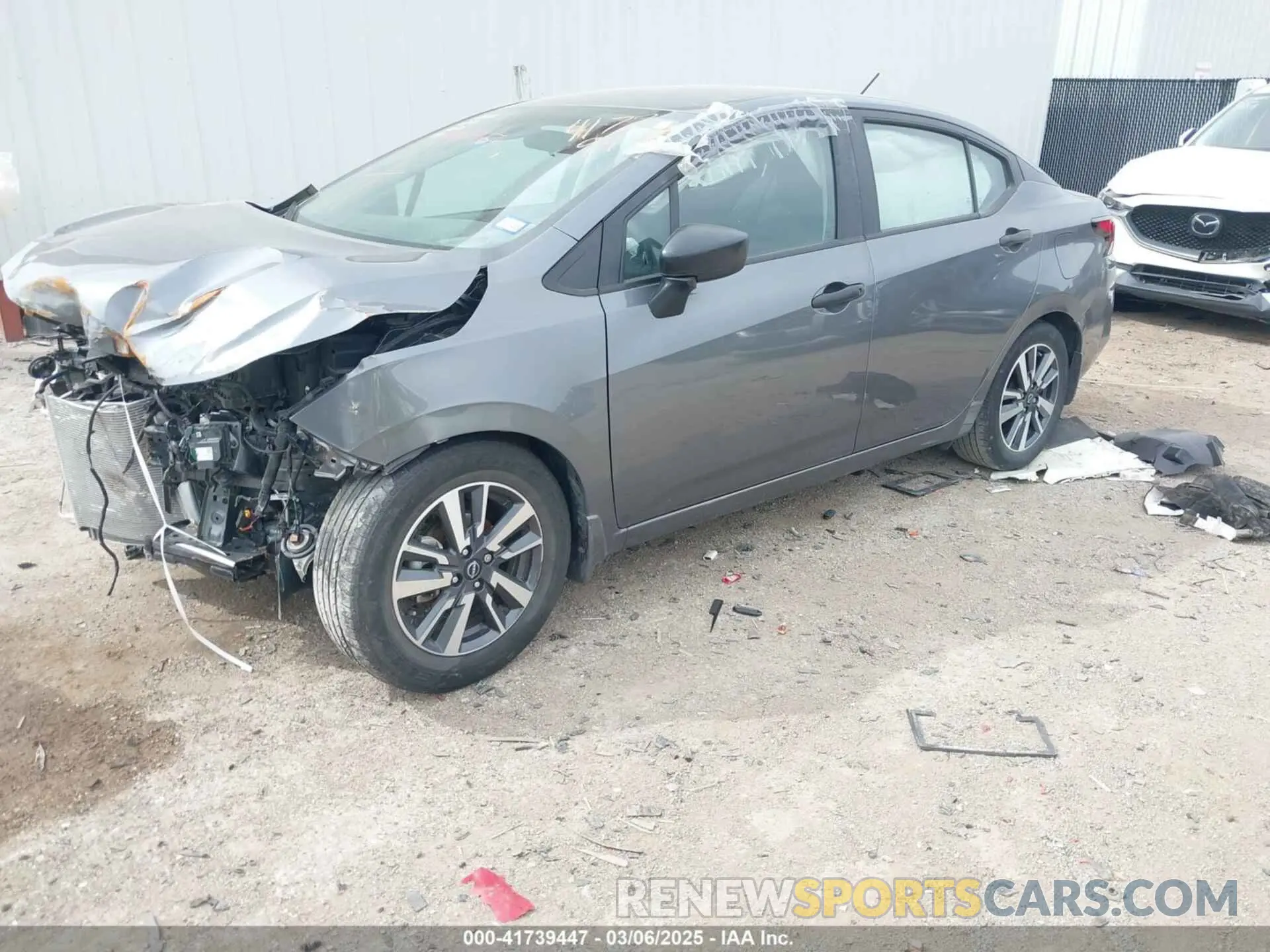 2 fotografías del automóvil dañado 3N1CN8DV2RL826287 NISSAN VERSA 2024