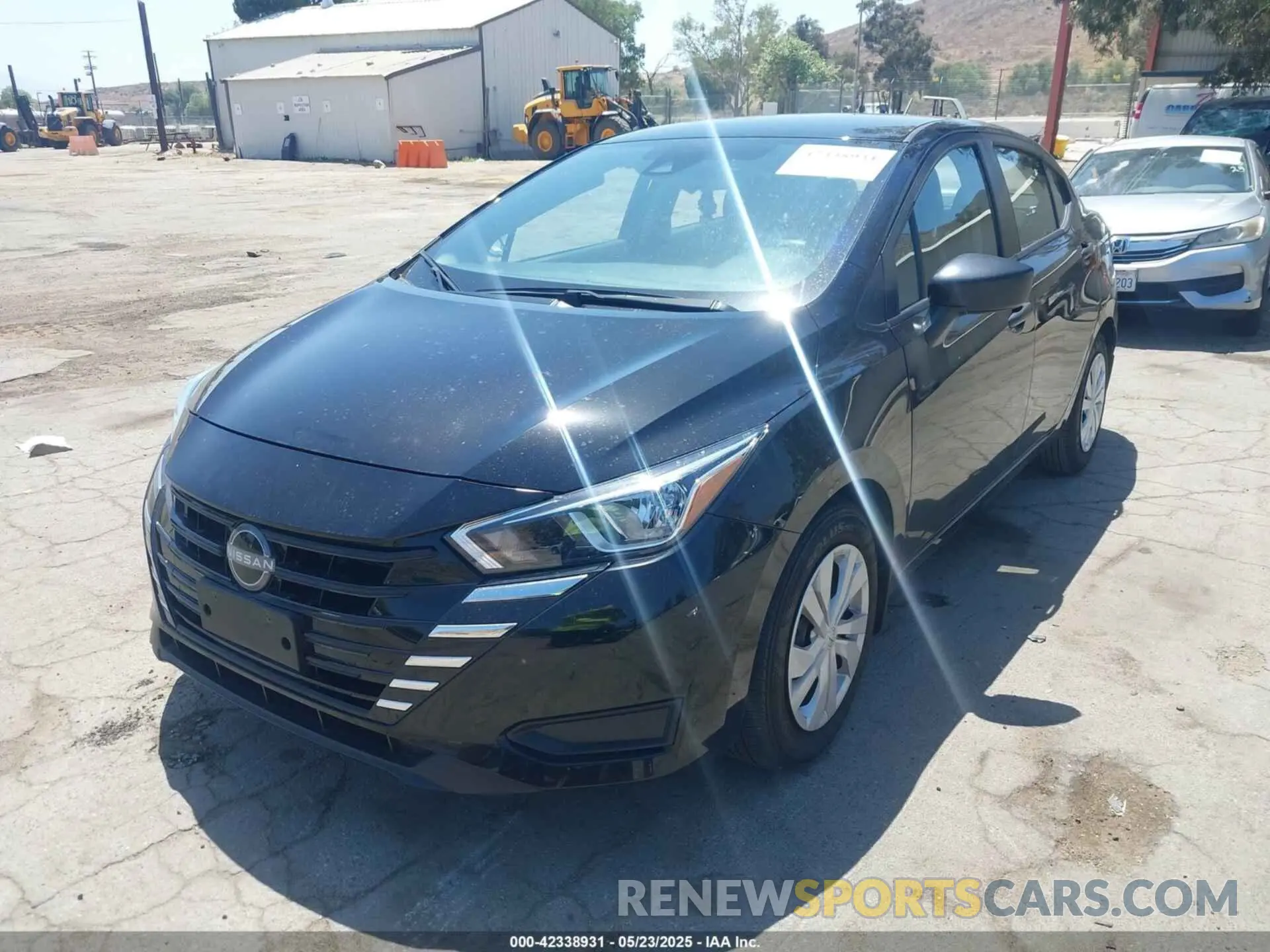 2 fotografías del automóvil dañado 3N1CN8DV7RL906667 NISSAN VERSA 2024