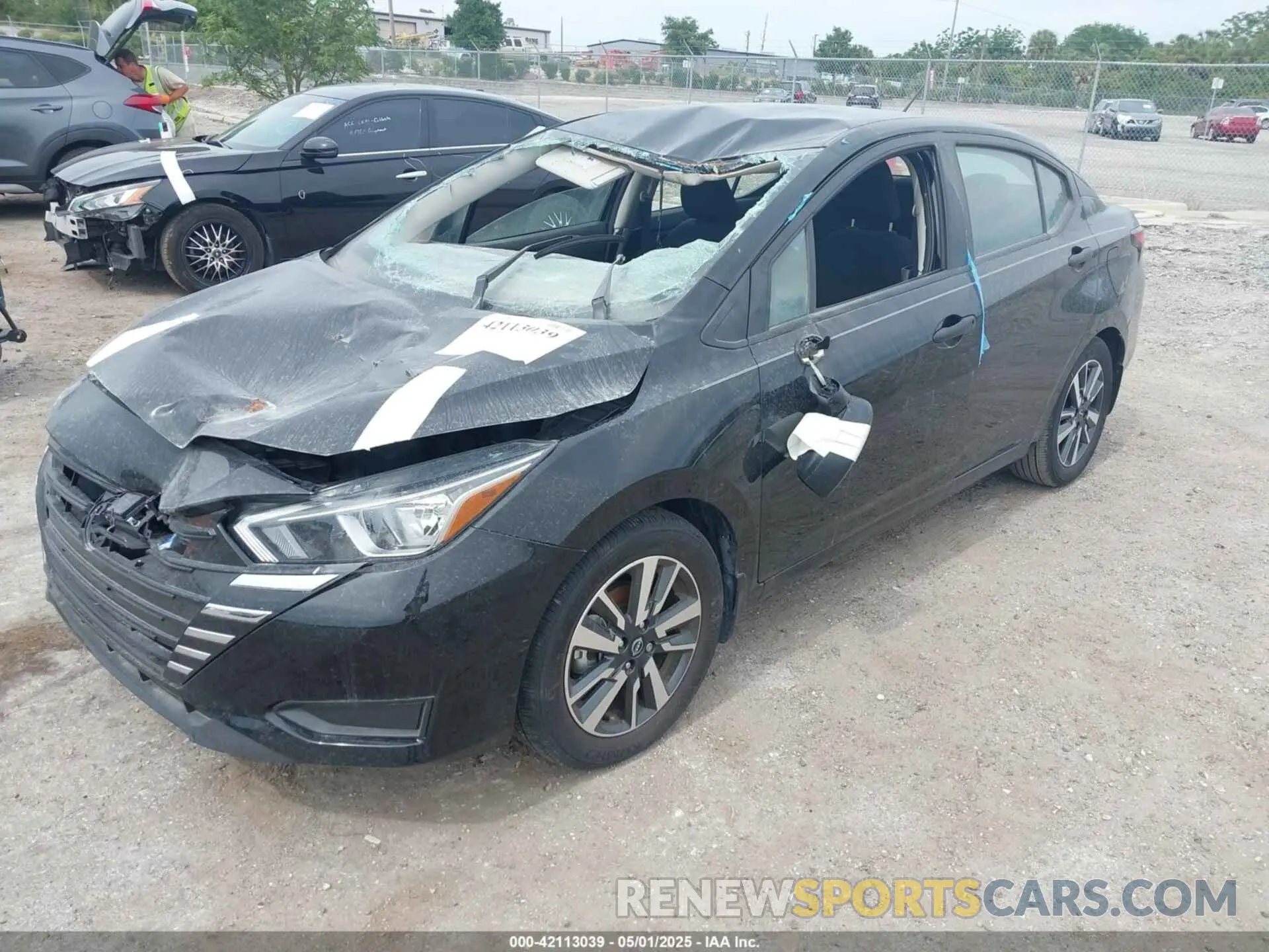 2 fotografías del automóvil dañado 3N1CN8DV9RL872828 NISSAN VERSA 2024