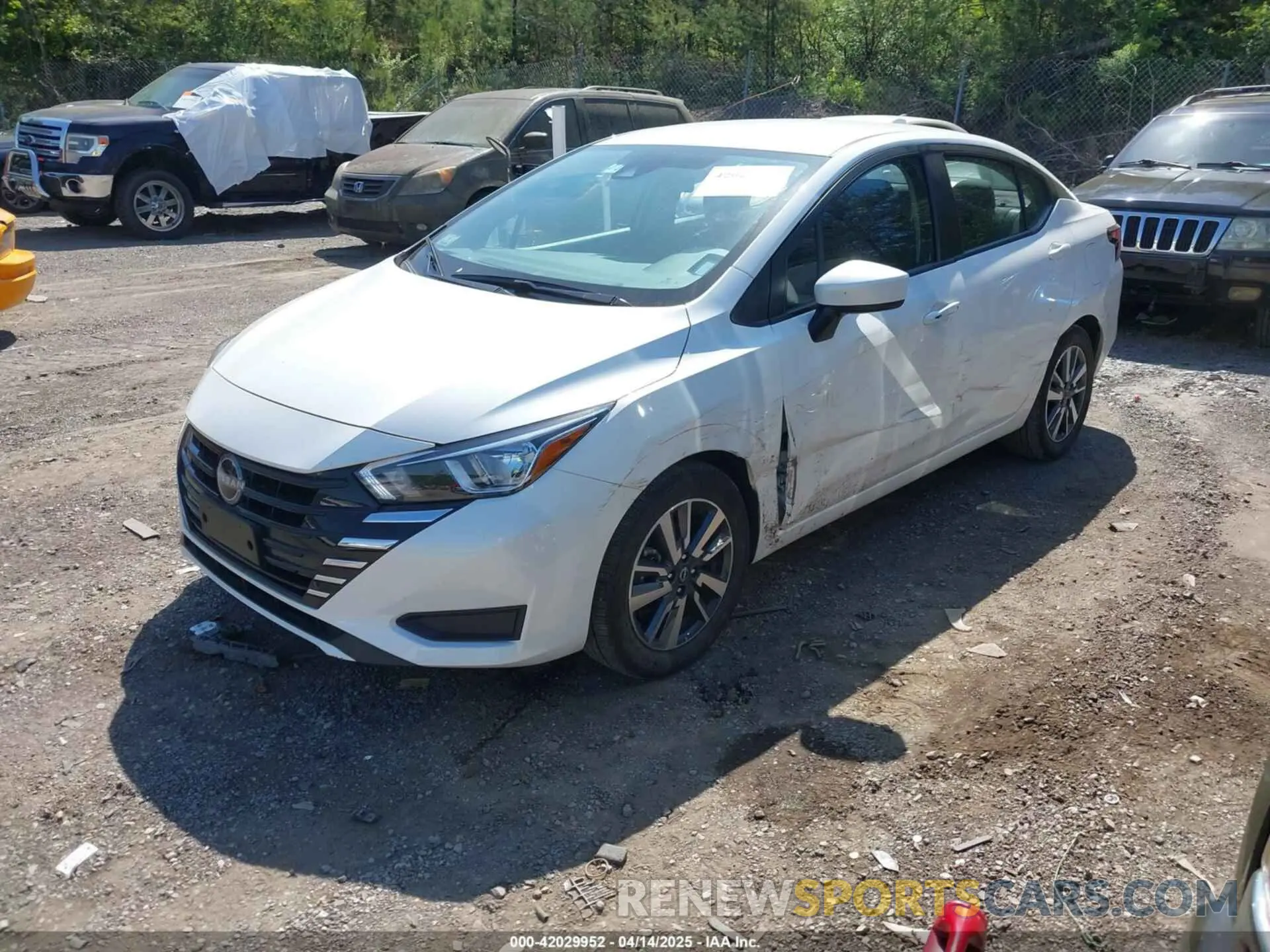 2 fotografías del automóvil dañado 3N1CN8EV8RL889974 NISSAN VERSA 2024