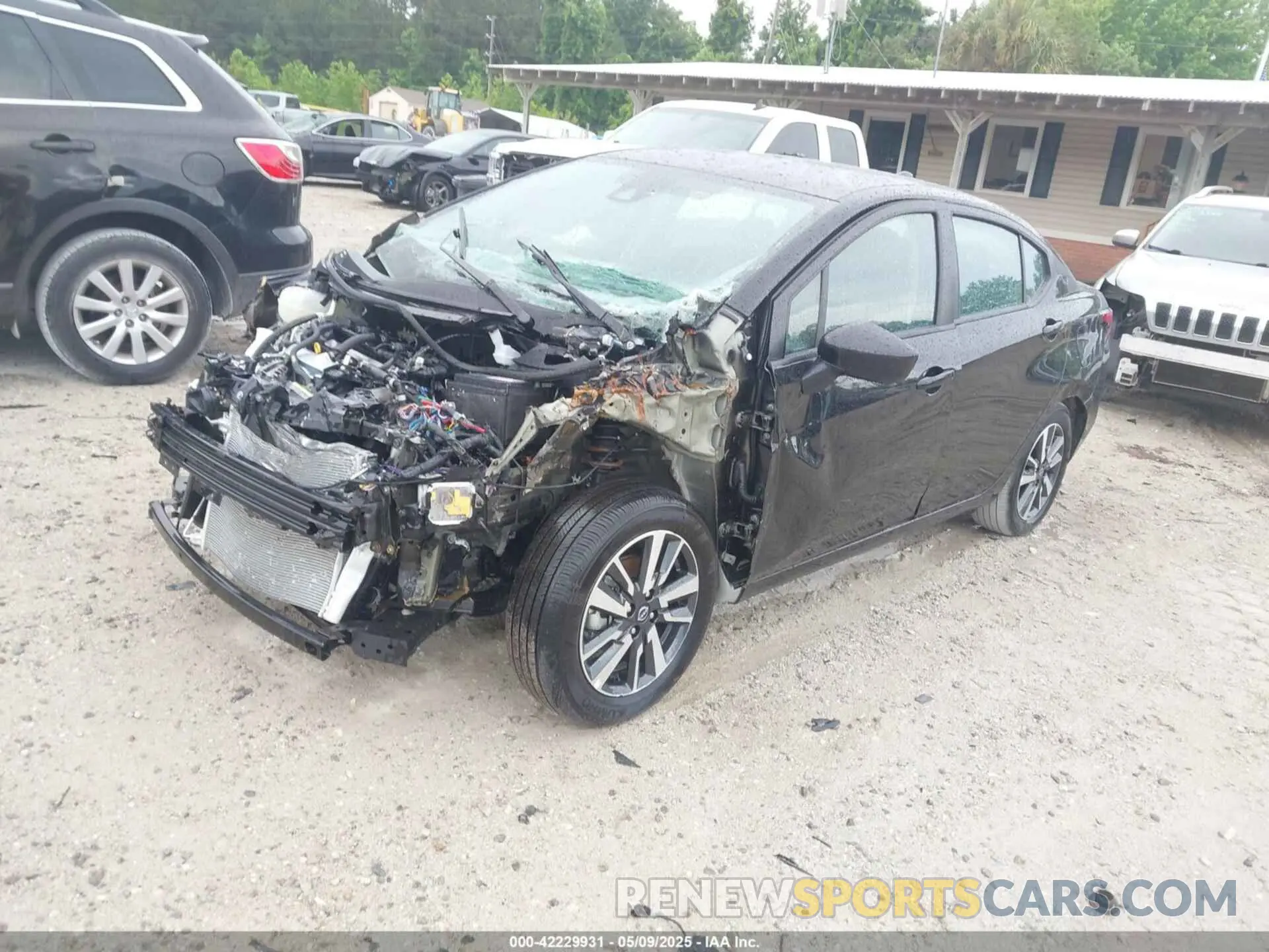 2 fotografías del automóvil dañado 3N1CN8EV1SL827211 NISSAN VERSA 2025