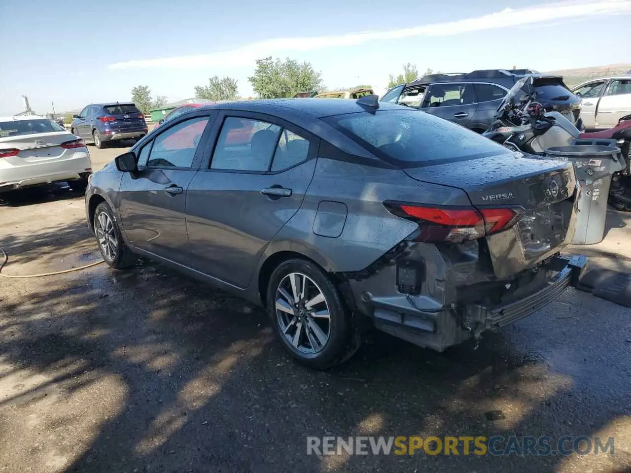 2 fotografías del automóvil dañado 3N1CN8EV2SL841229 NISSAN VERSA 2025