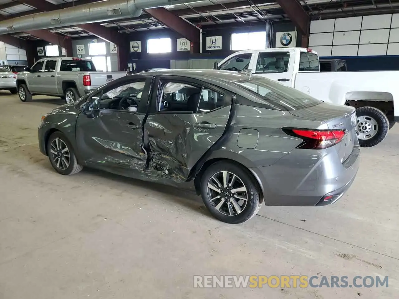 2 fotografías del automóvil dañado 3N1CN8EV4SL825243 NISSAN VERSA 2025