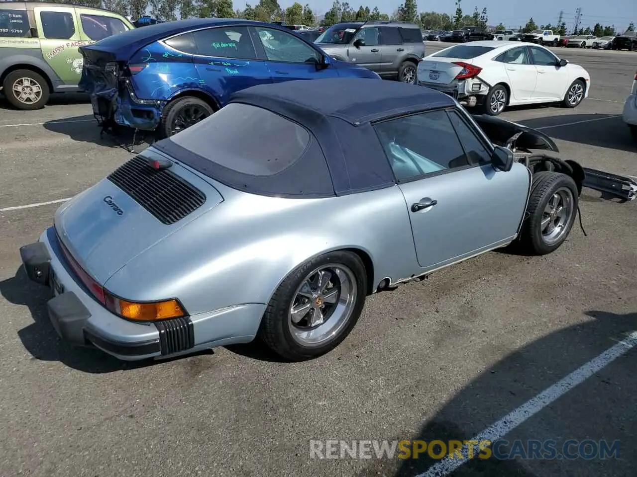 3 fotografías del automóvil dañado WP0EB0911HS172422 PORSCHE 911 1987