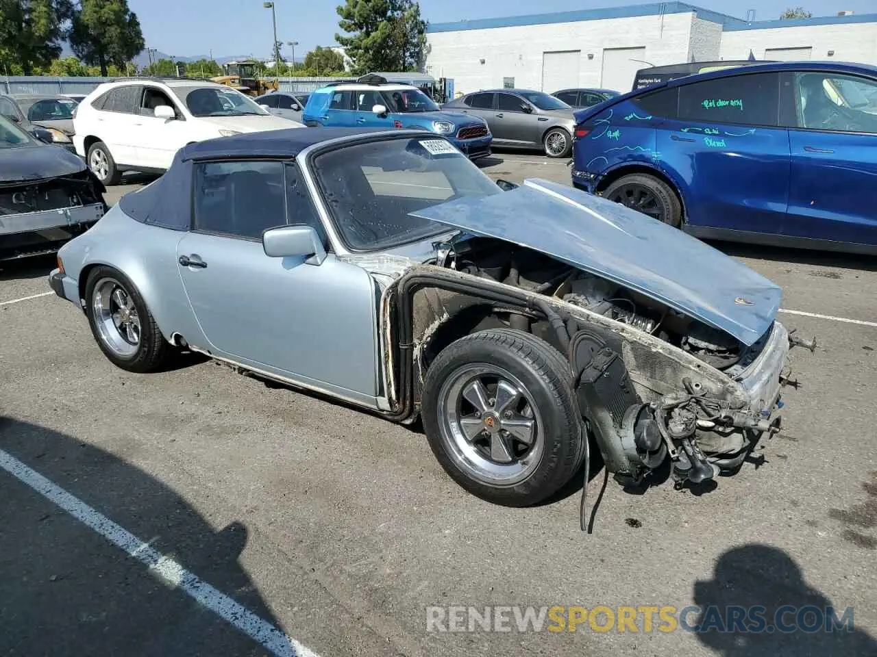 4 fotografías del automóvil dañado WP0EB0911HS172422 PORSCHE 911 1987