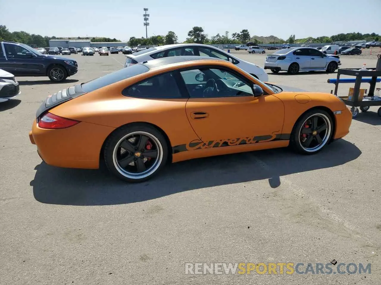 3 fotografías del automóvil dañado WP0AB29939S721135 PORSCHE 911 2009