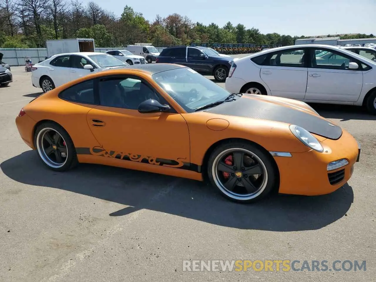 4 fotografías del automóvil dañado WP0AB29939S721135 PORSCHE 911 2009