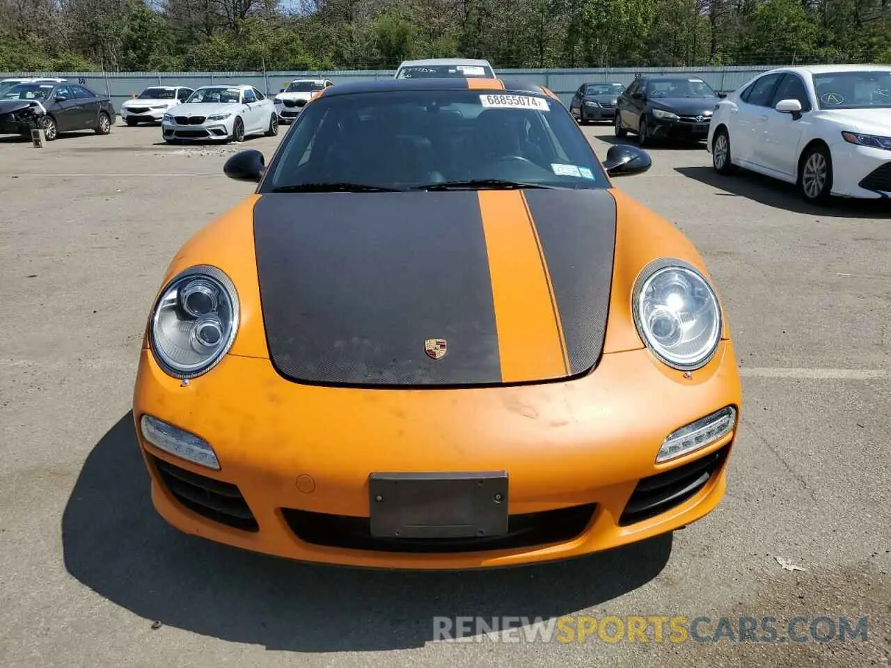 5 fotografías del automóvil dañado WP0AB29939S721135 PORSCHE 911 2009