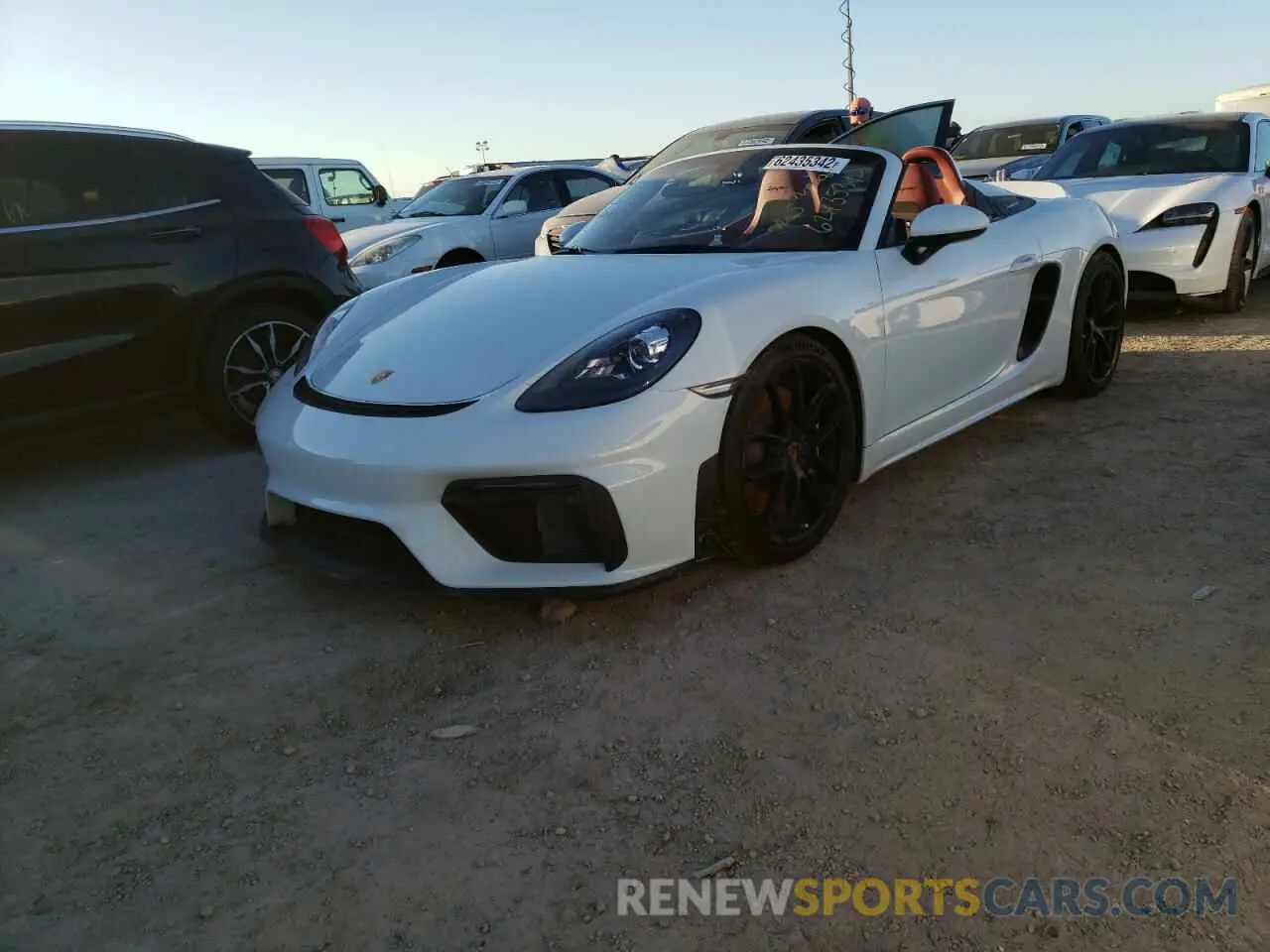 2 fotografías del automóvil dañado WP0CC2A8XMS240820 PORSCHE BOXSTER 2021