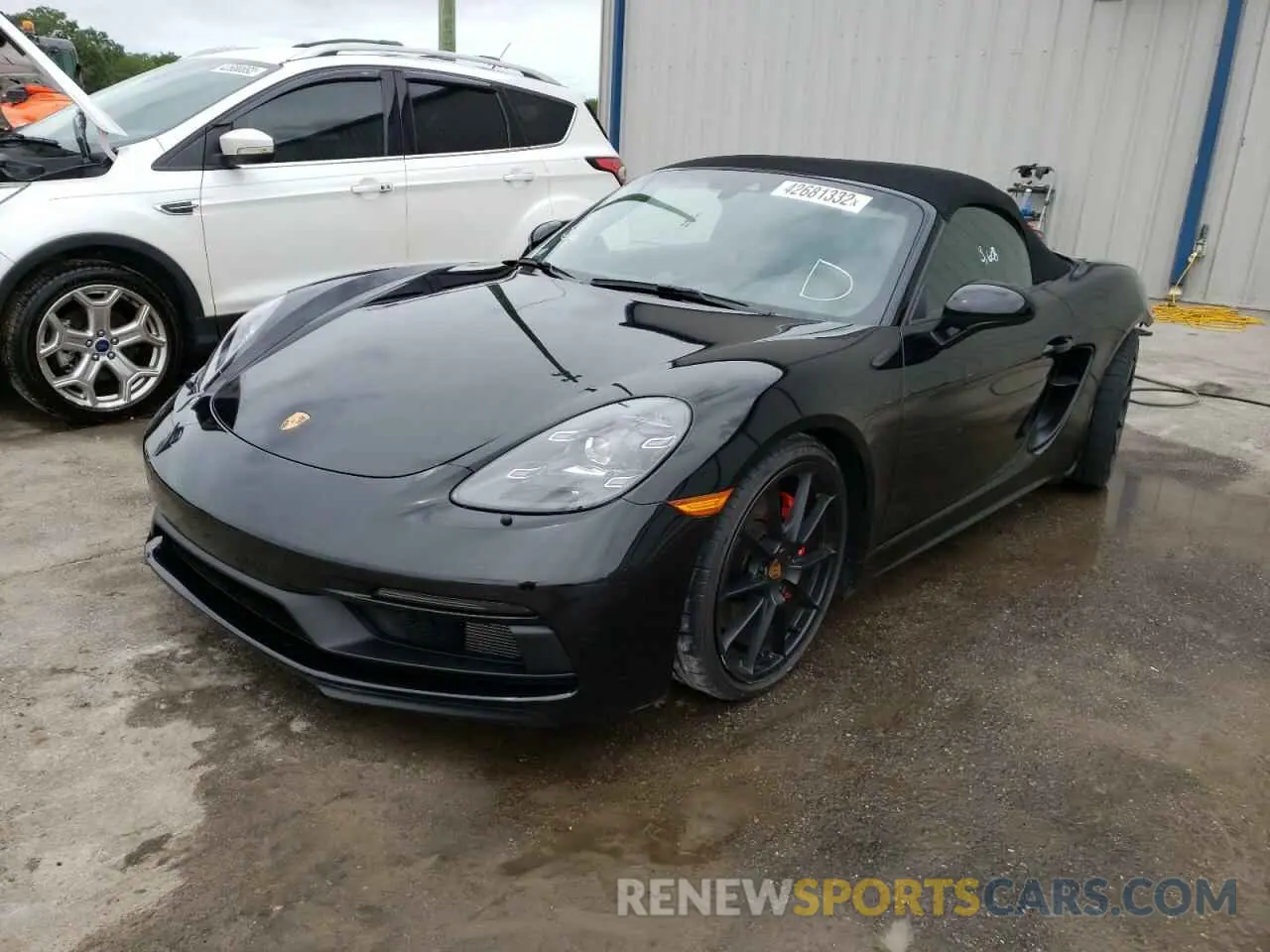 2 fotografías del automóvil dañado WP0CD2A84MS232144 PORSCHE BOXSTER 2021