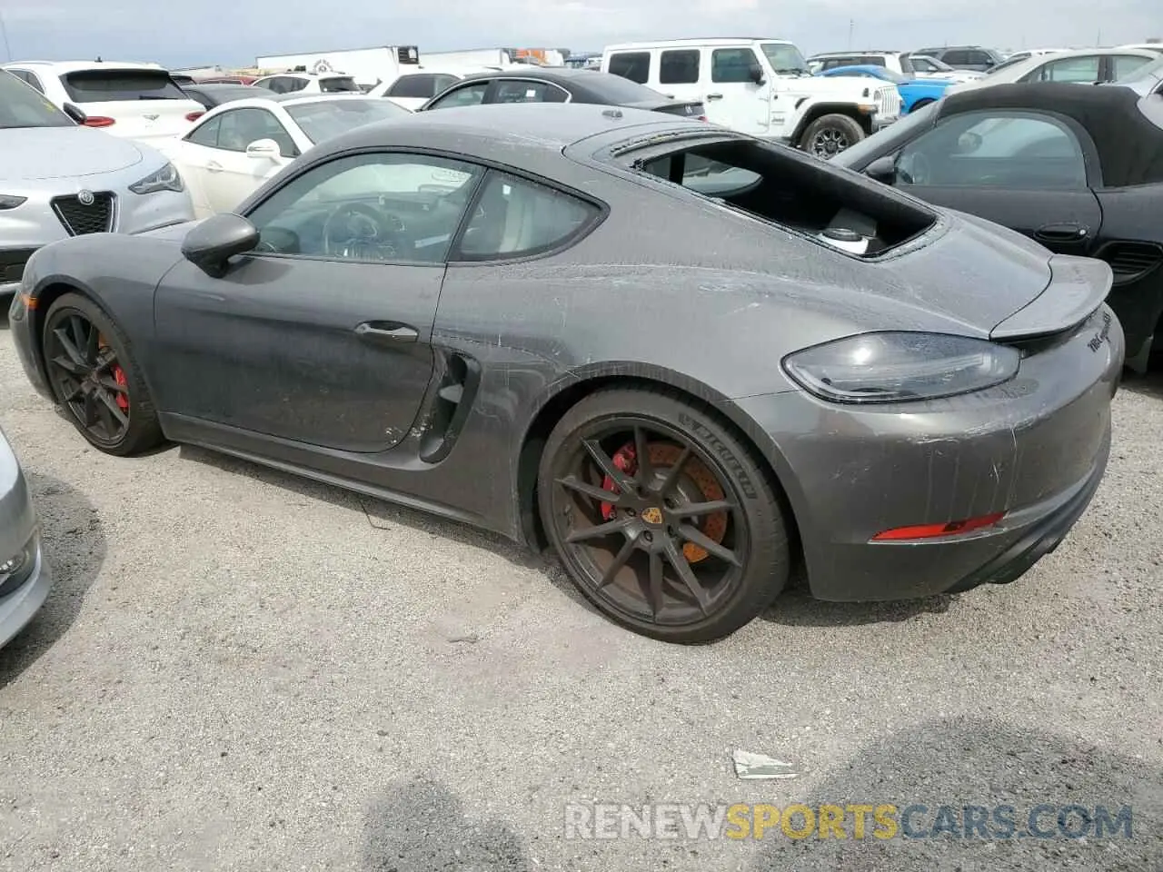 2 fotografías del automóvil dañado WP0AD2A8XNS268199 PORSCHE CAYMAN 2022