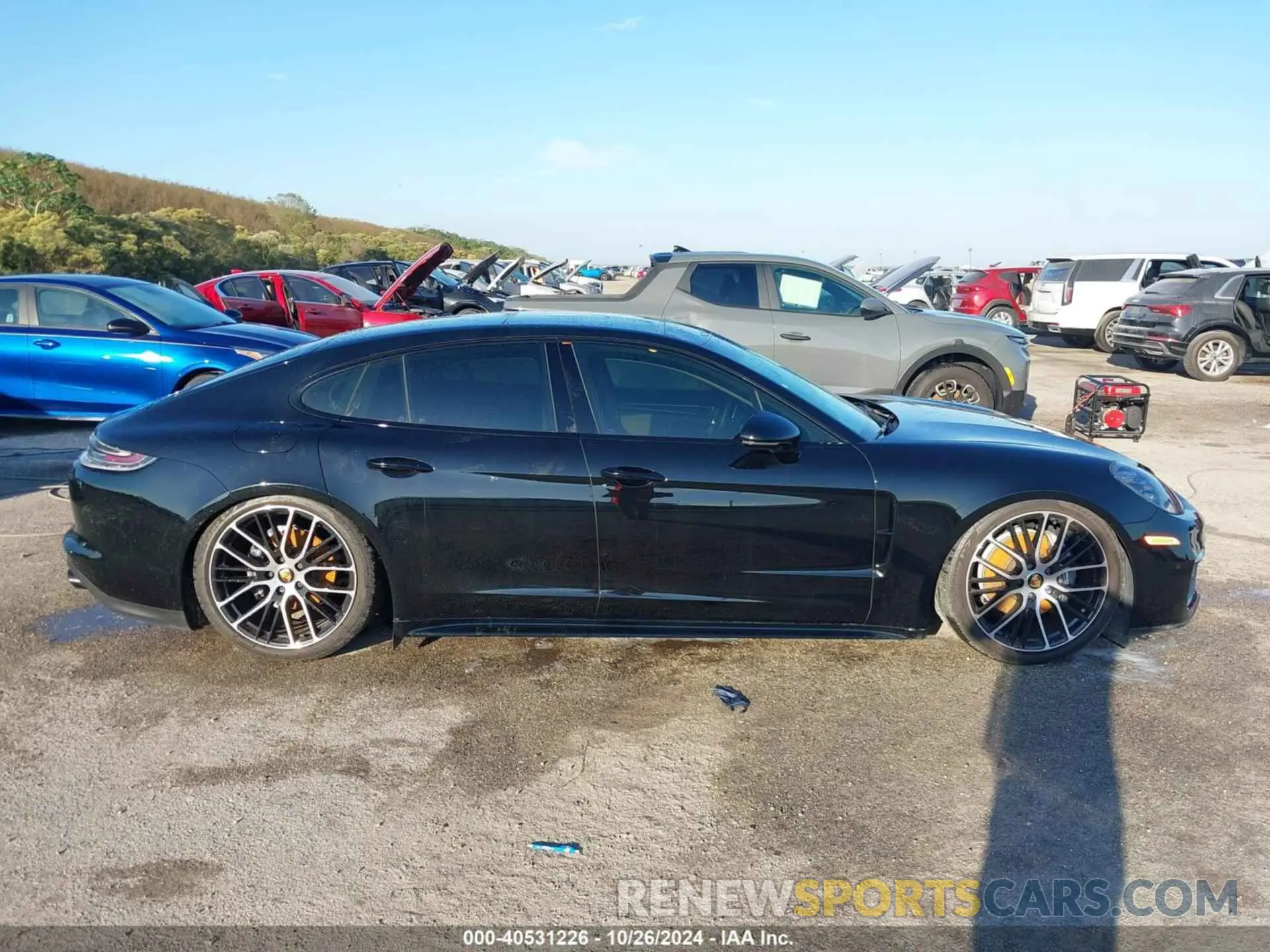 13 fotografías del automóvil dañado WP0AJ2A7XPL100107 PORSCHE PANAMERA 2023