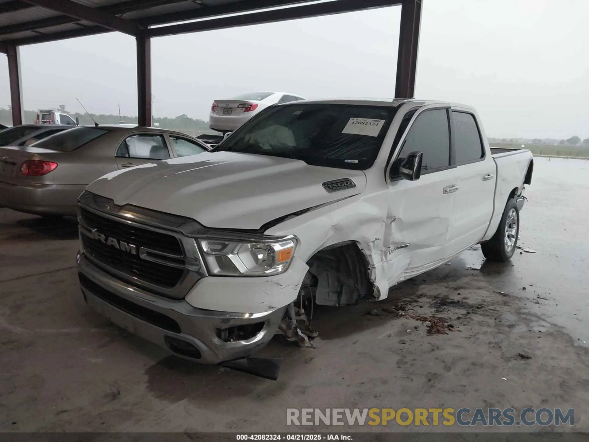 2 fotografías del automóvil dañado 1C6RREFT0KN604351 RAM 1500 2019