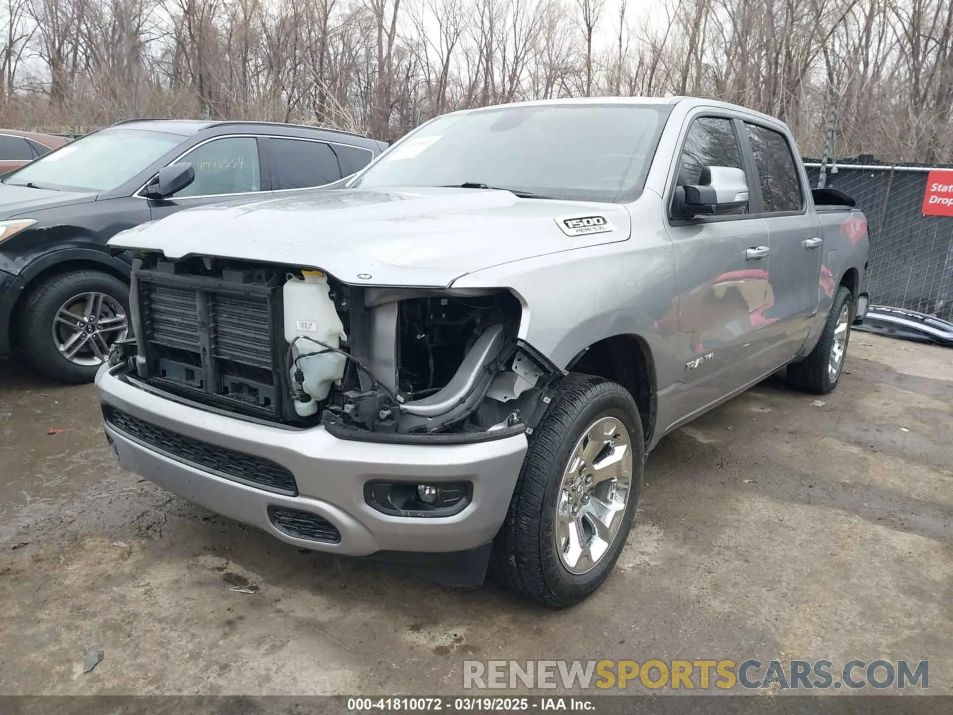 2 fotografías del automóvil dañado 1C6RREFT0KN705714 RAM 1500 2019