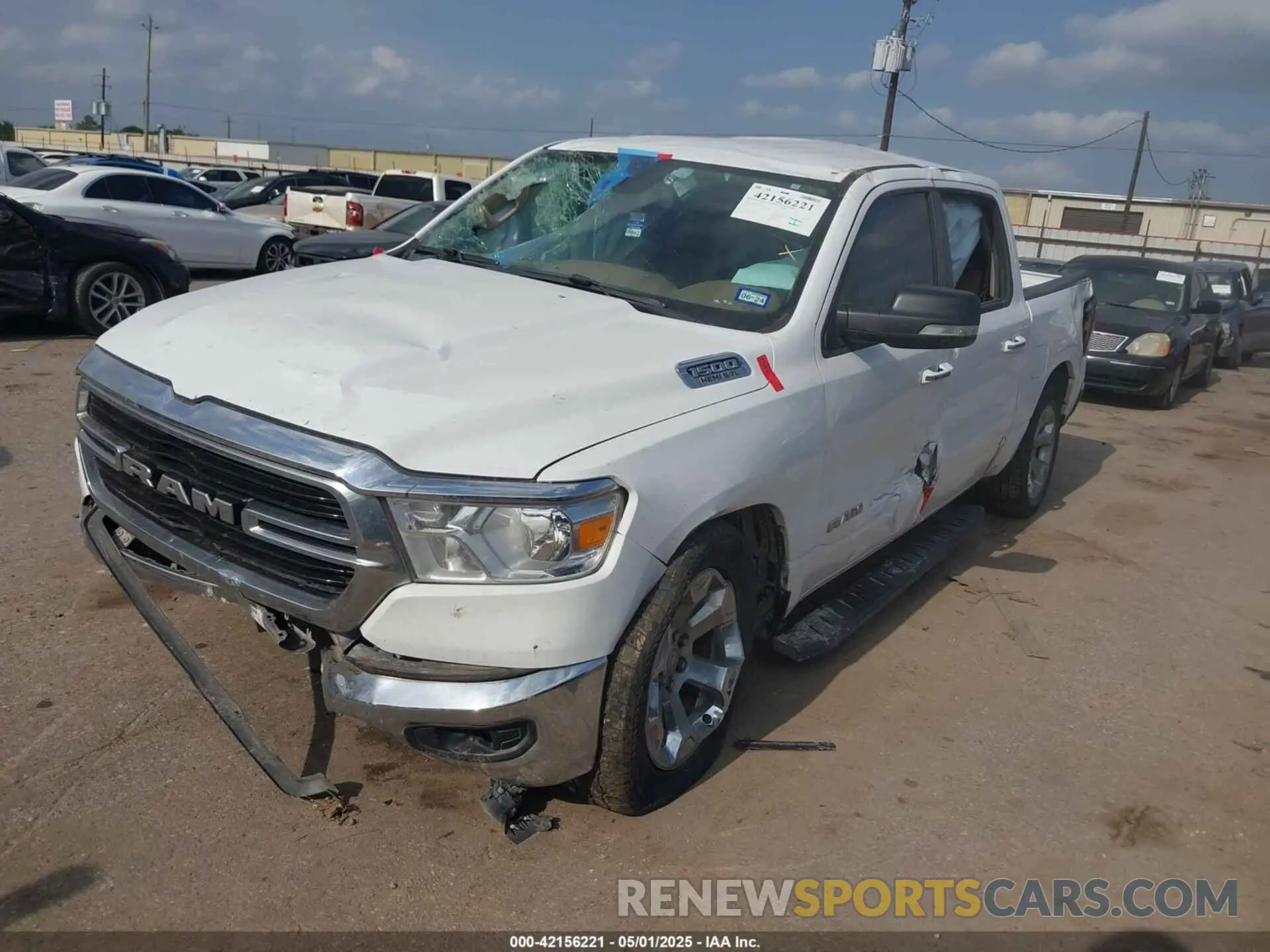 2 fotografías del automóvil dañado 1C6RREFT5KN596490 RAM 1500 2019