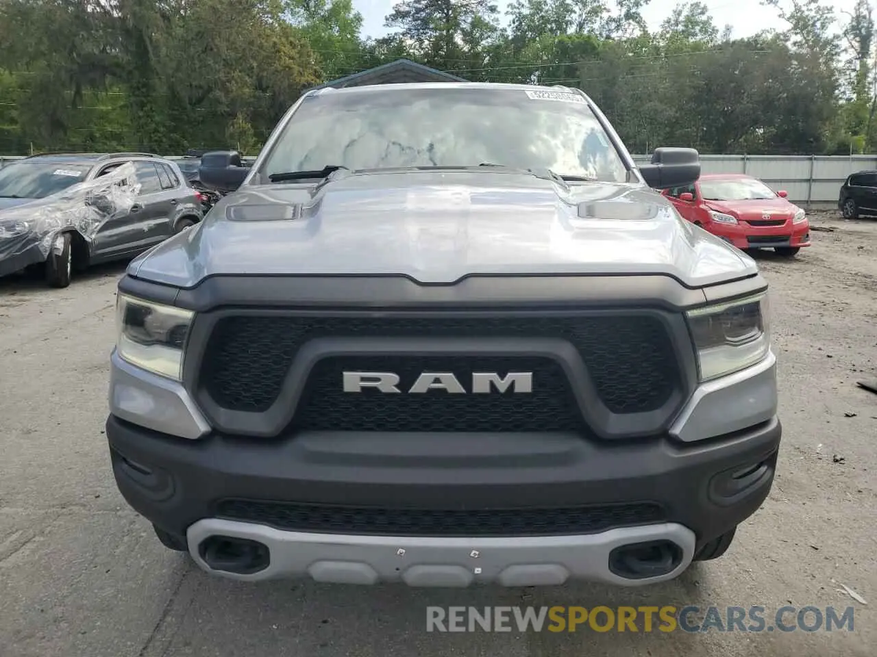 5 fotografías del automóvil dañado 1C6SRFET1KN875363 RAM 1500 2019