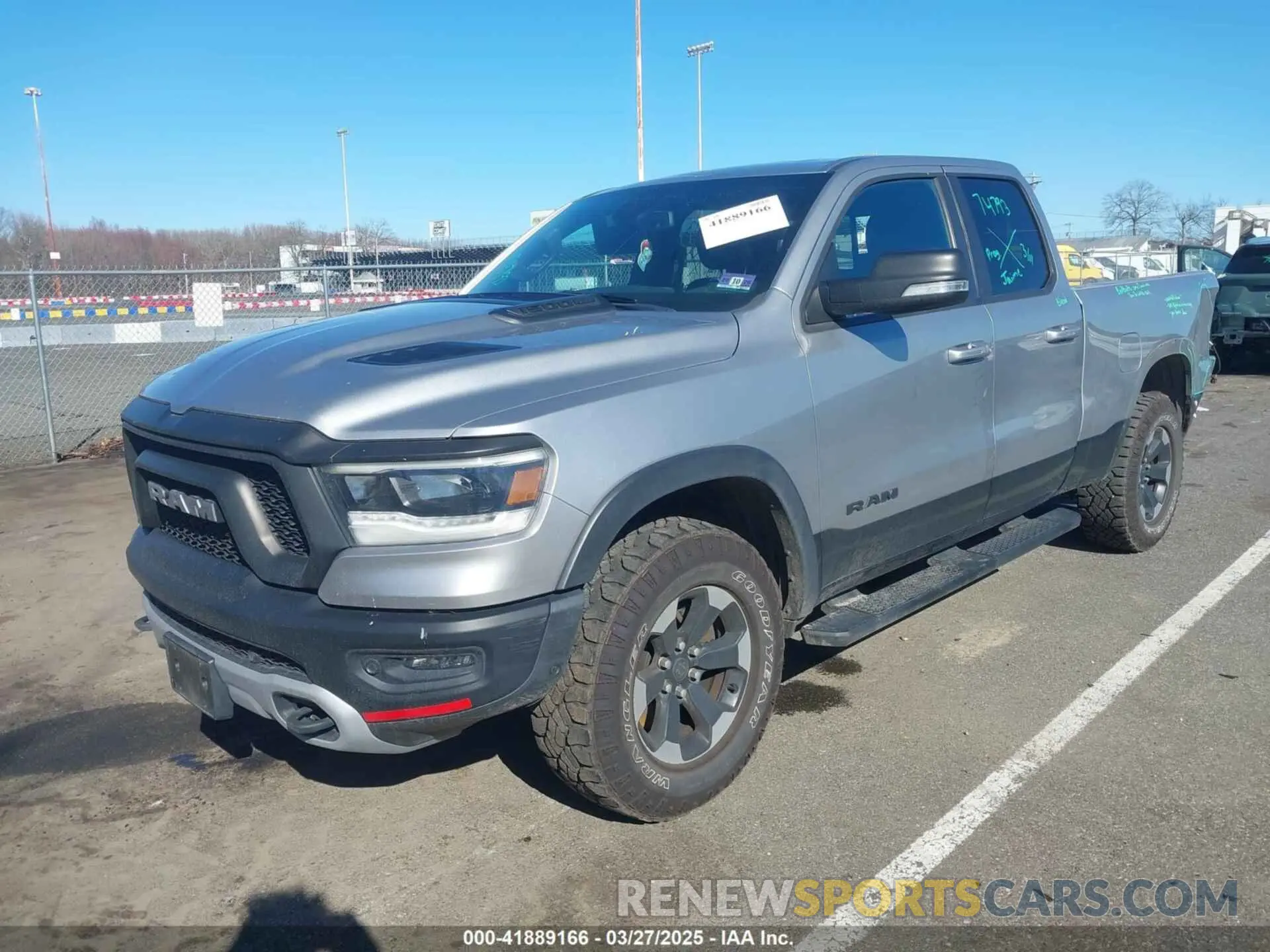 2 fotografías del automóvil dañado 1C6SRFET2KN671753 RAM 1500 2019
