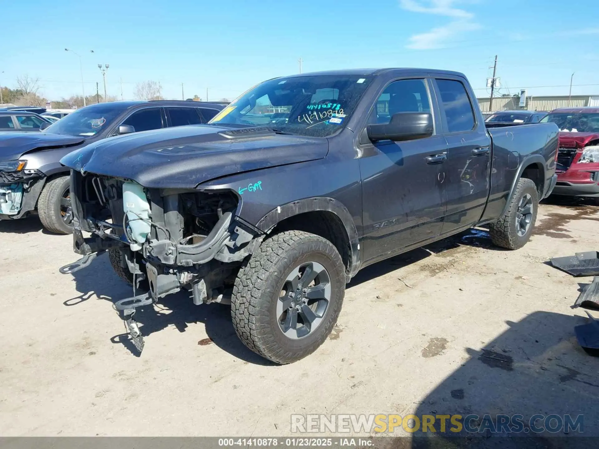 2 fotografías del automóvil dañado 1C6SRFET7KN861046 RAM 1500 2019