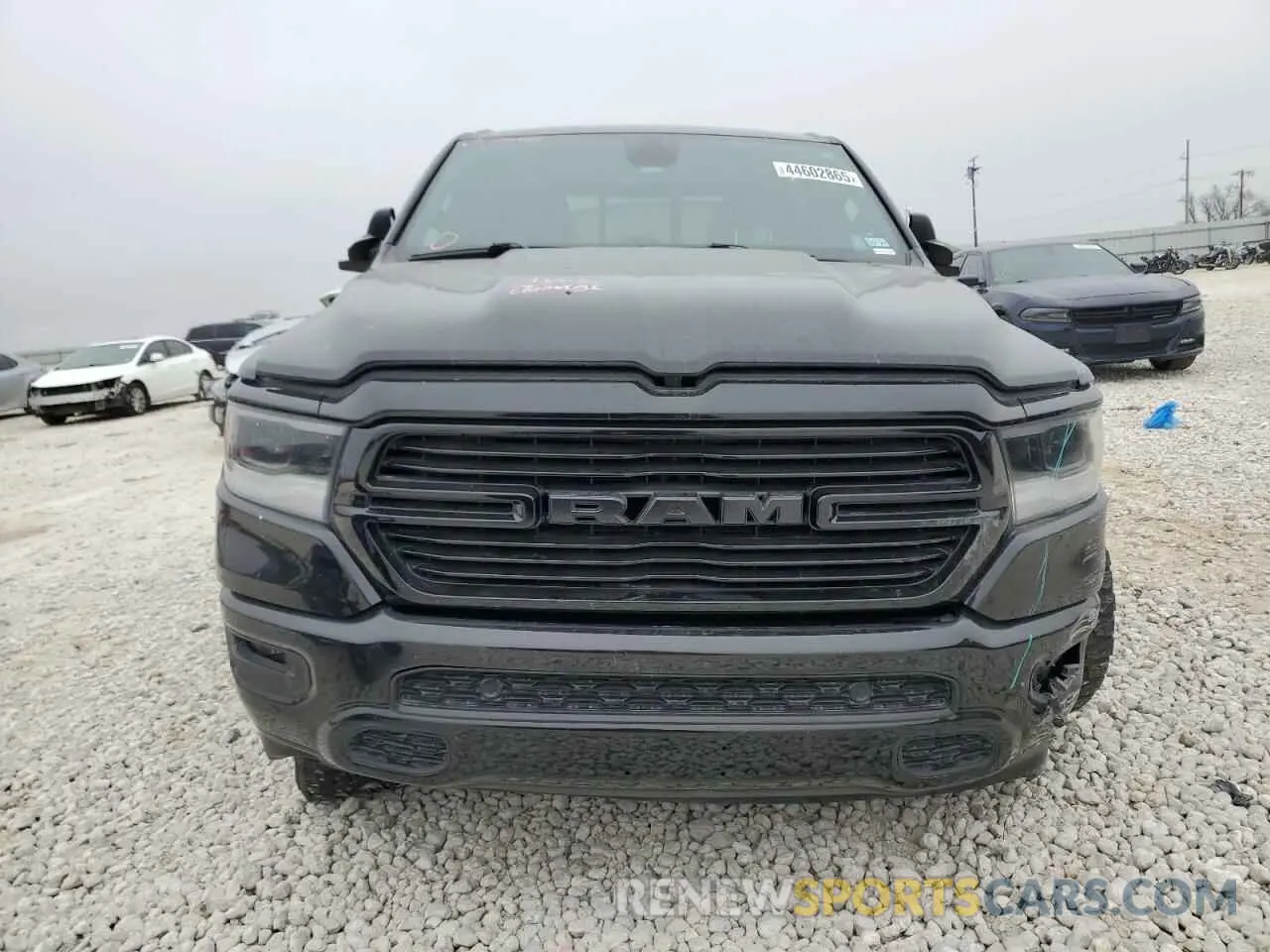 5 fotografías del automóvil dañado 1C6SRFFT3KN909351 RAM 1500 2019