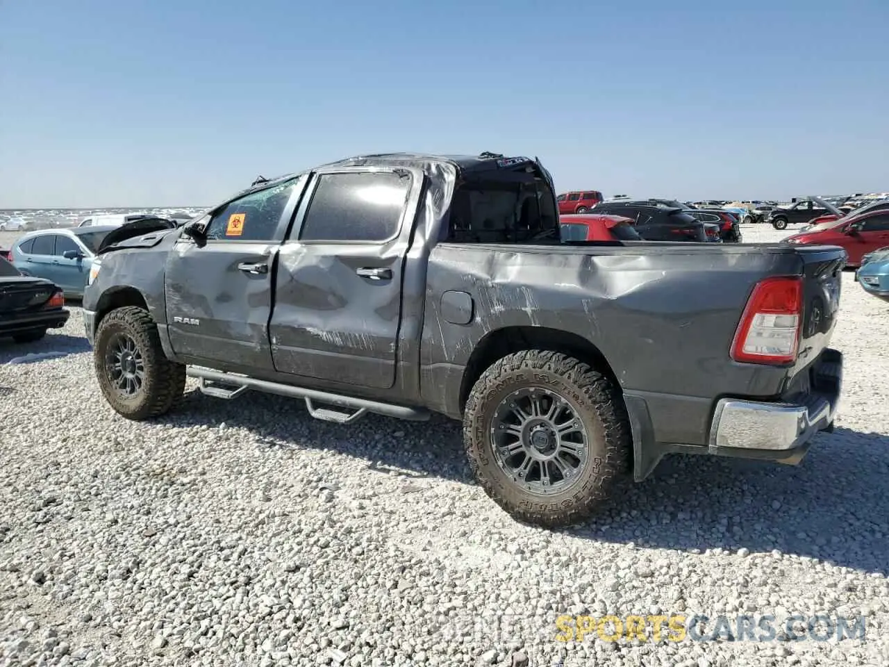 2 fotografías del automóvil dañado 1C6SRFFT6KN600666 RAM 1500 2019