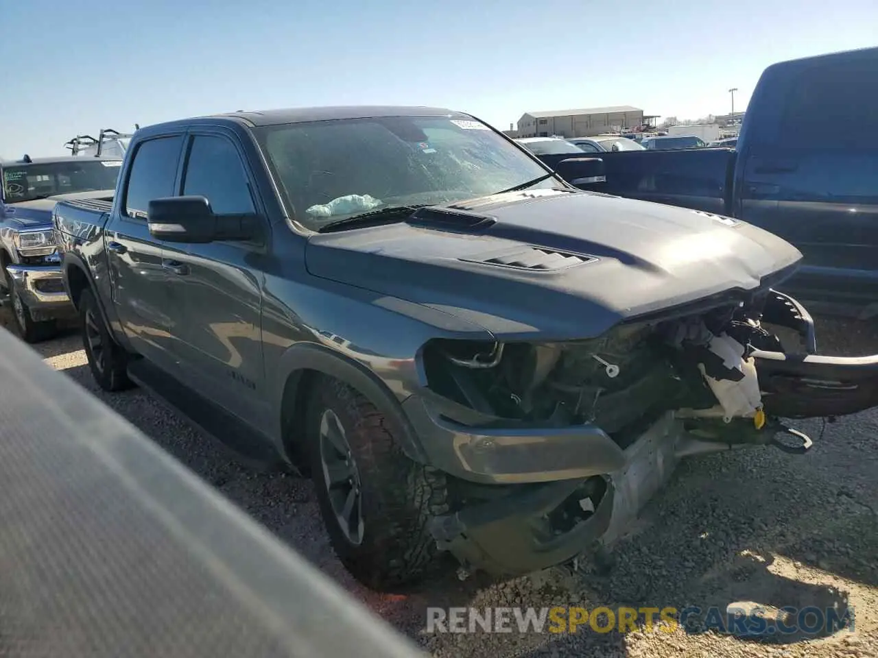 4 fotografías del automóvil dañado 1C6SRFLT3KN767586 RAM 1500 2019