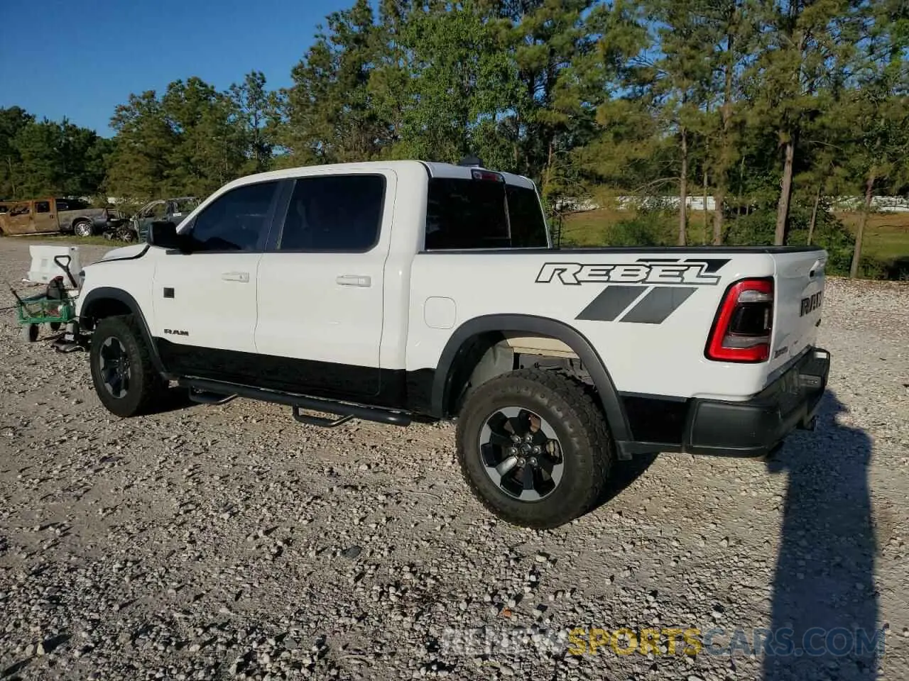 2 fotografías del automóvil dañado 1C6SRFLT5KN845107 RAM 1500 2019