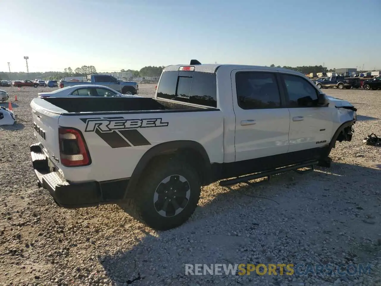 3 fotografías del automóvil dañado 1C6SRFLT5KN845107 RAM 1500 2019