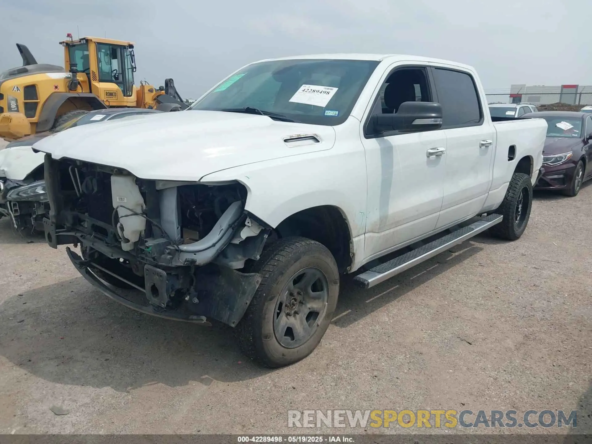 2 fotografías del automóvil dañado 1C6SRFMT9KN644227 RAM 1500 2019