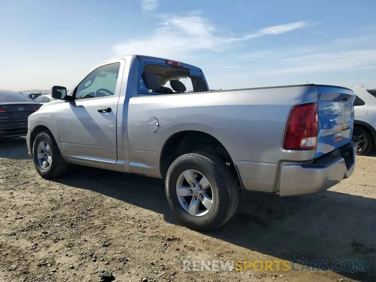 2 fotografías del automóvil dañado 3C6JR6AGXKG678799 RAM 1500 2019