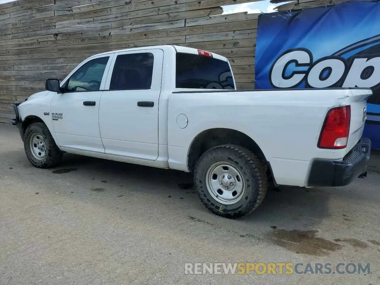 2 fotografías del automóvil dañado 3C6RR7KT5KG564228 RAM 1500 2019