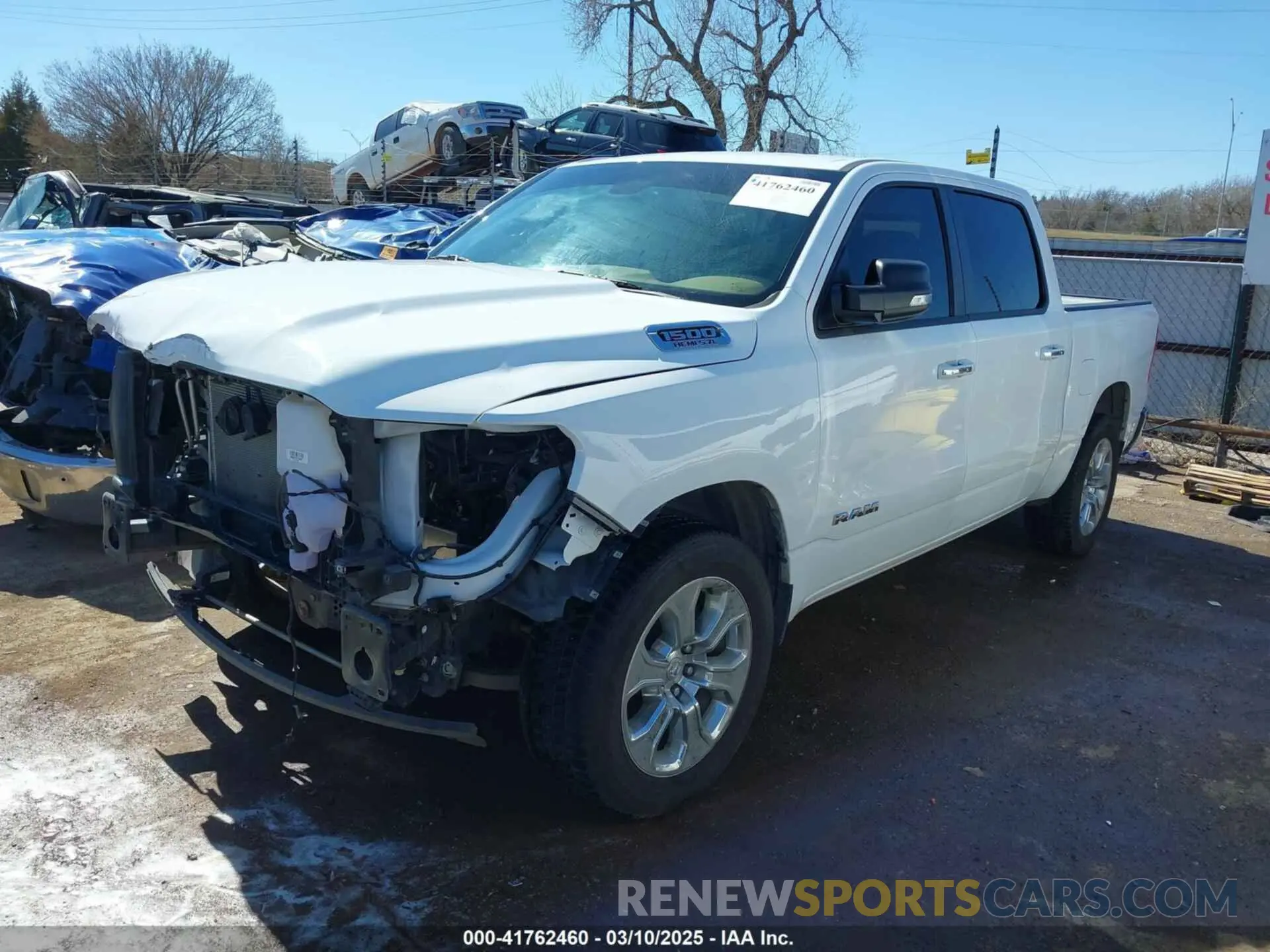 2 fotografías del automóvil dañado 1C6RREFT0LN311731 RAM 1500 2020