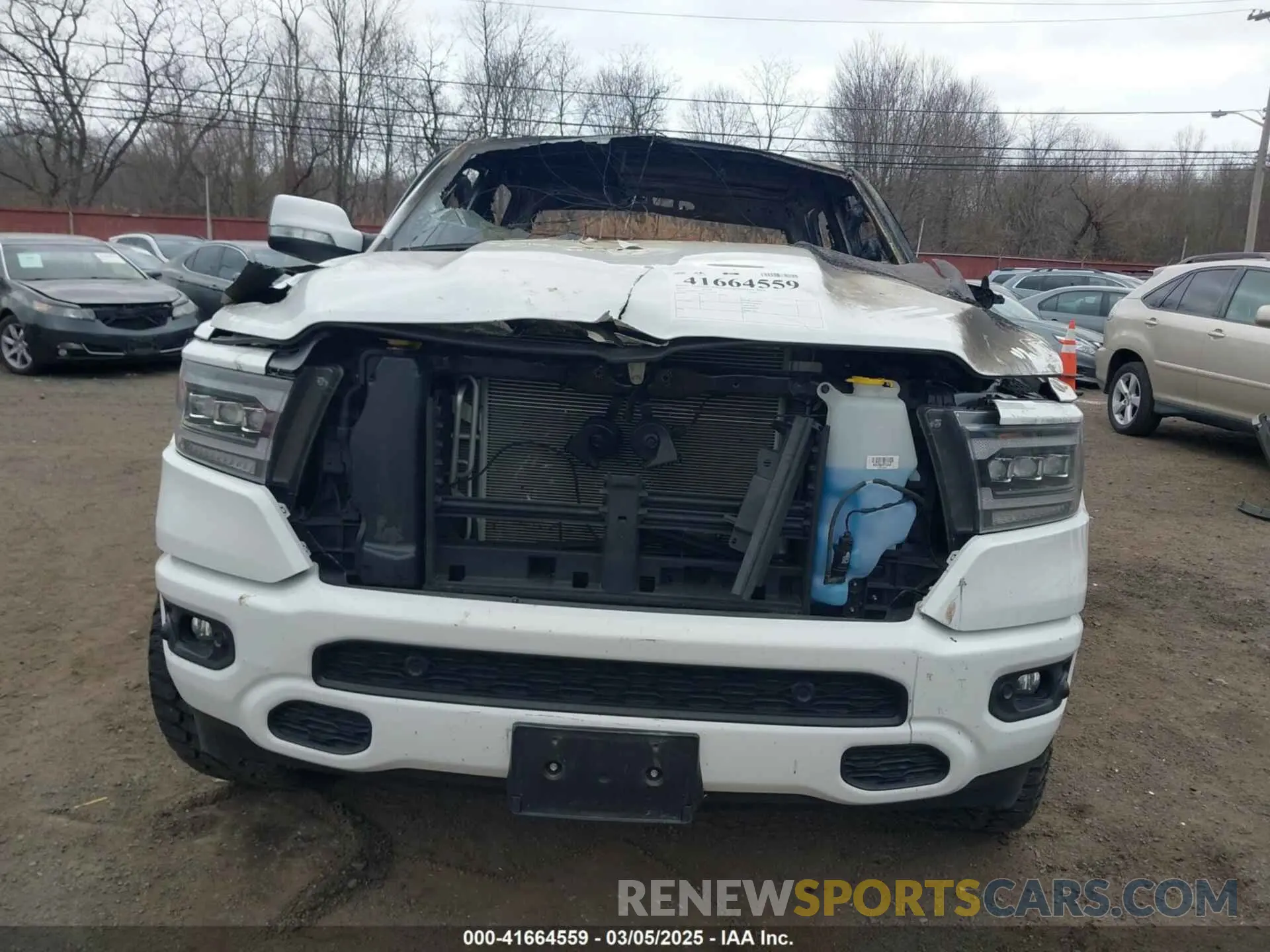 12 fotografías del automóvil dañado 1C6SRFFT3LN304070 RAM 1500 2020