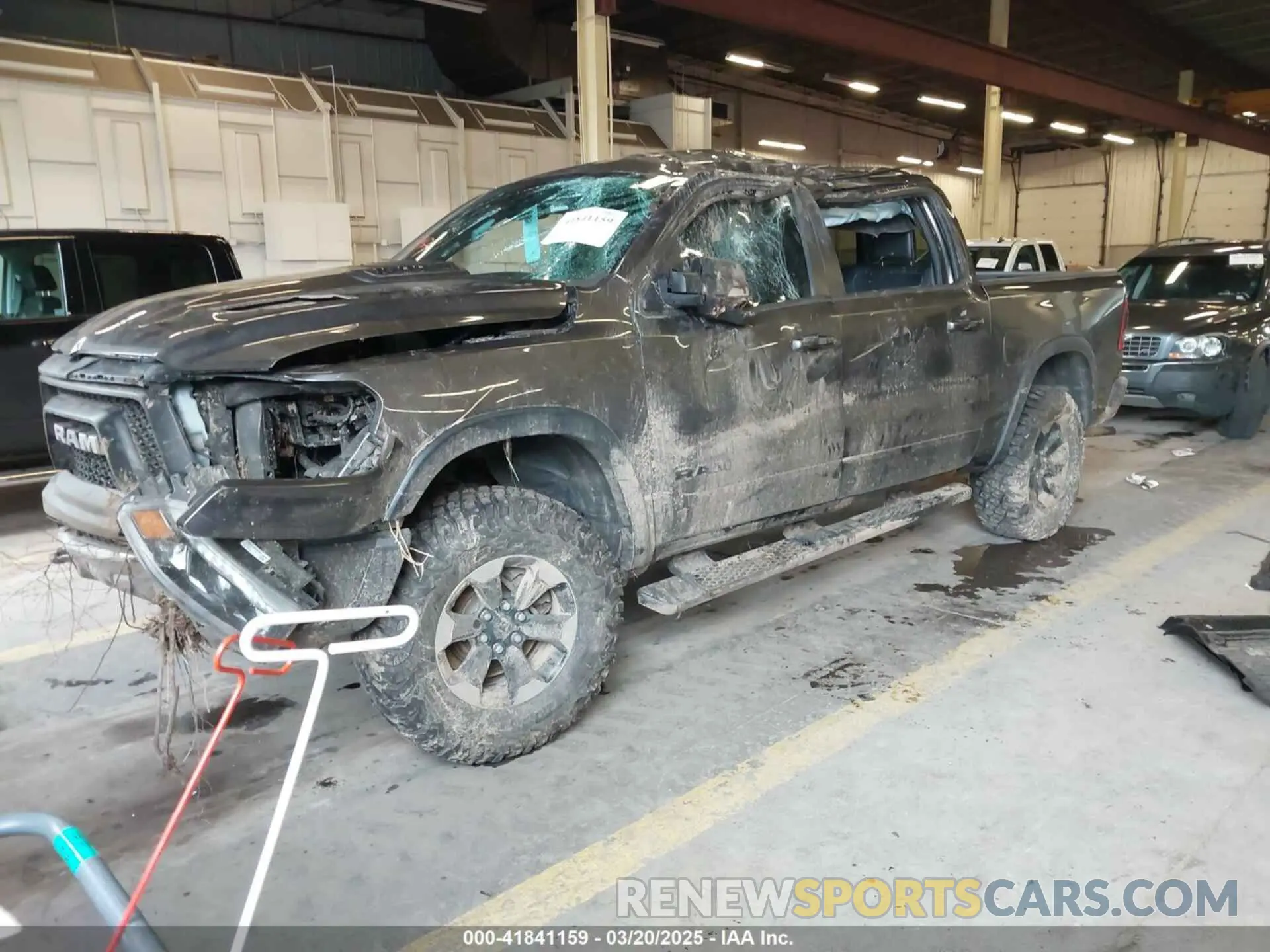2 fotografías del automóvil dañado 1C6SRFLT0LN162491 RAM 1500 2020