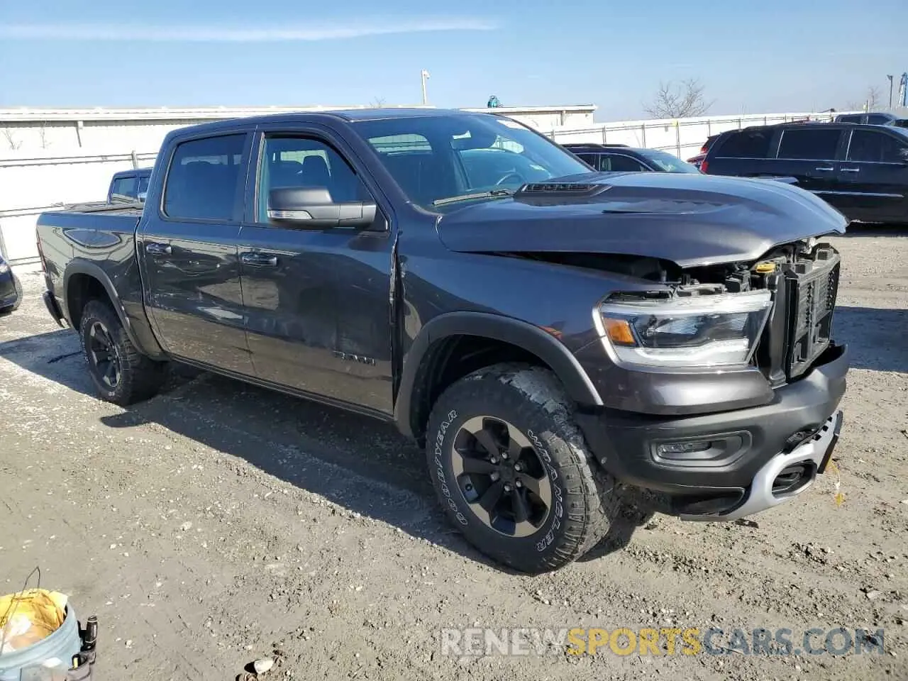 4 fotografías del automóvil dañado 1C6SRFLT1LN148339 RAM 1500 2020