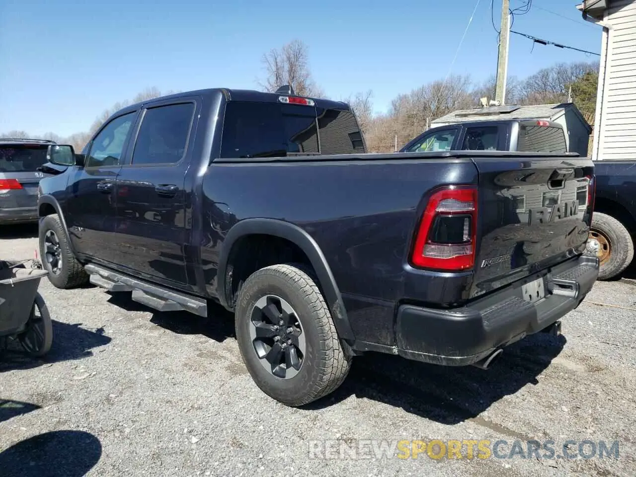 2 fotografías del automóvil dañado 1C6SRFLTXLN342707 RAM 1500 2020