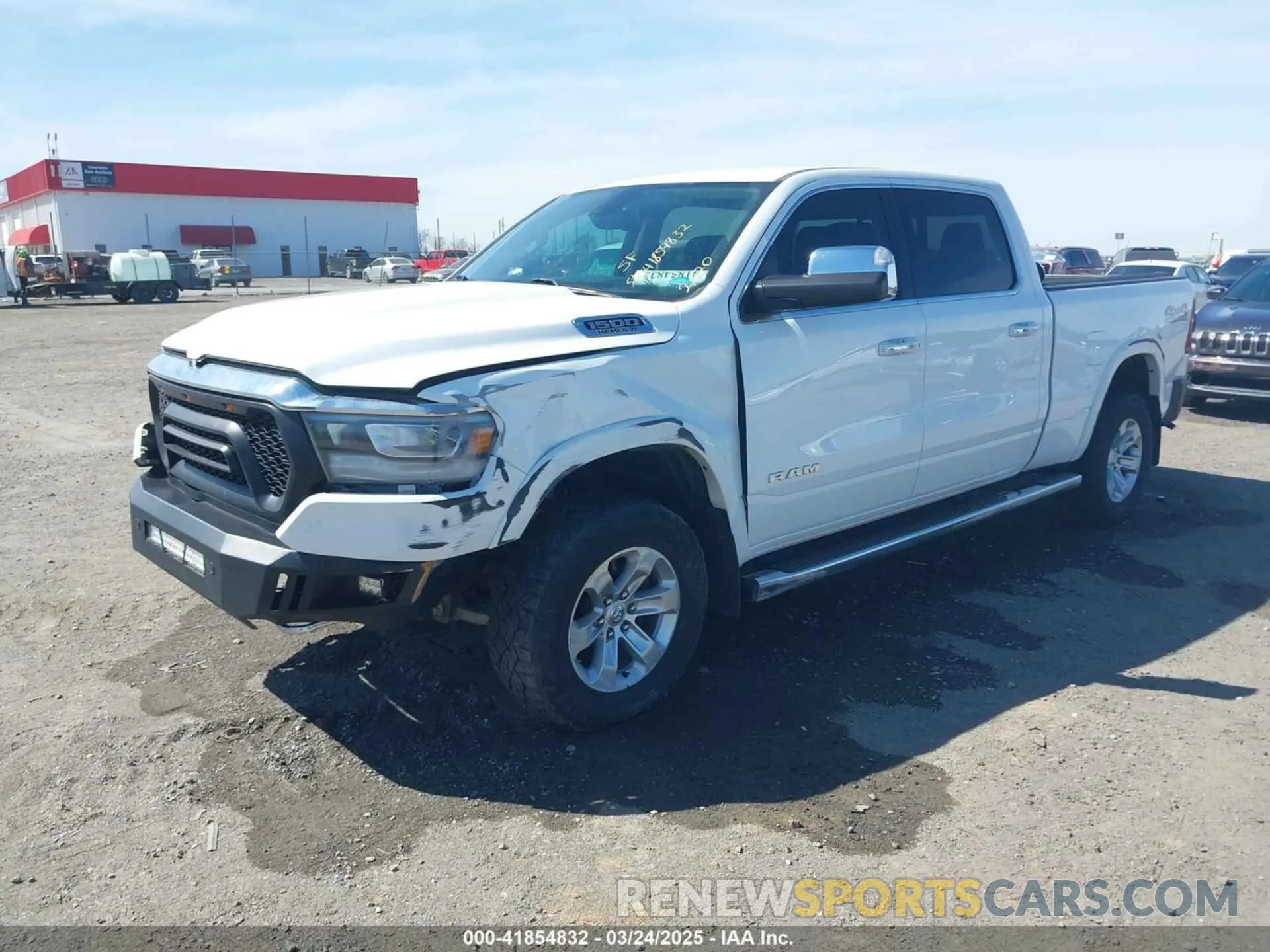 2 fotografías del automóvil dañado 1C6SRFRT5LN279572 RAM 1500 2020