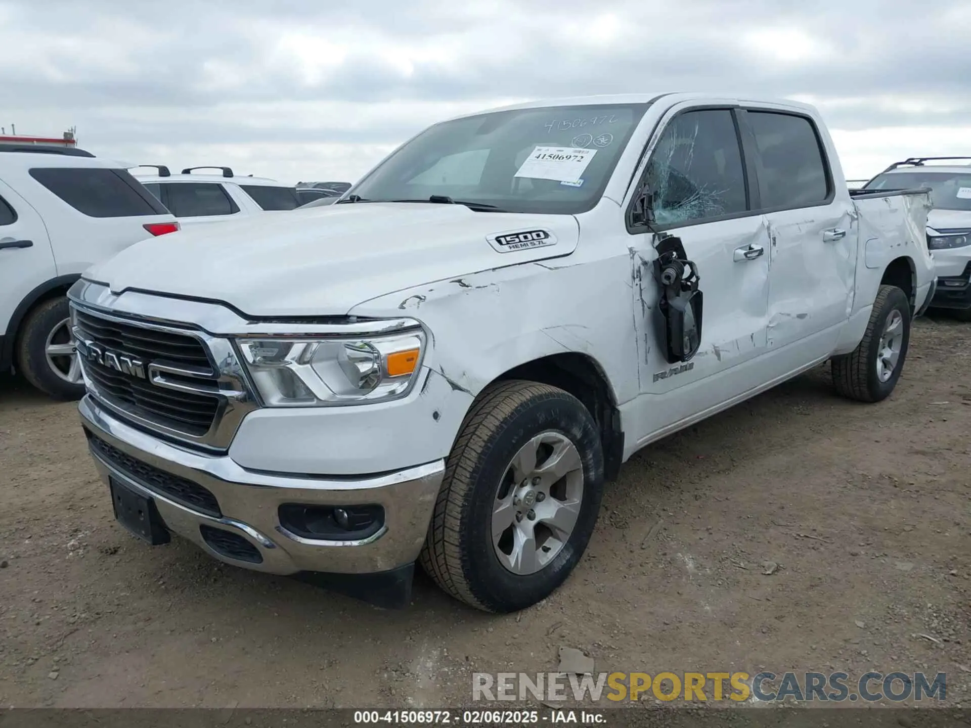 2 fotografías del automóvil dañado 1C6RREFTXMN501974 RAM 1500 2021