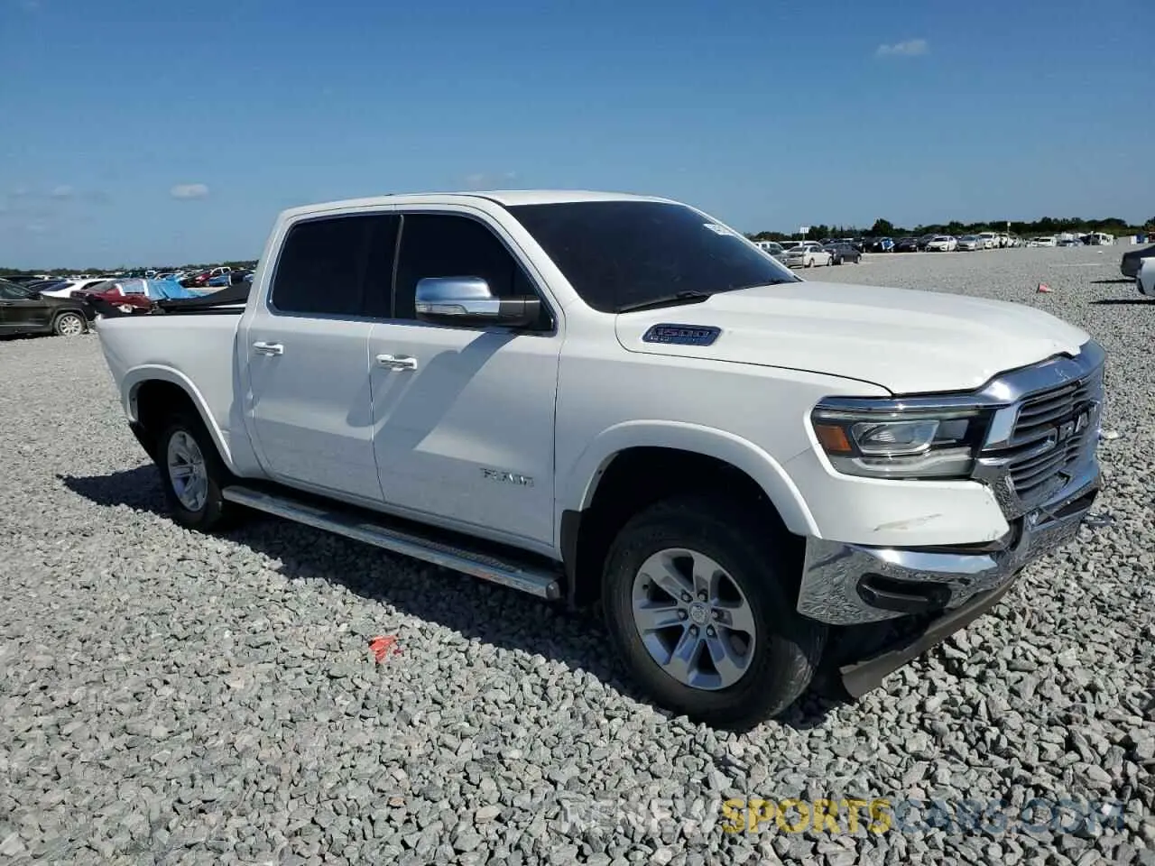 4 fotografías del automóvil dañado 1C6RREJT4MN820424 RAM 1500 2021