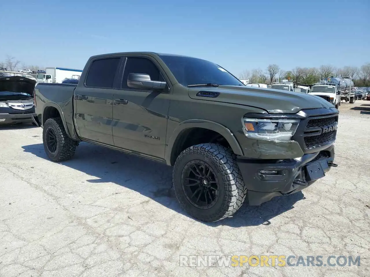 4 fotografías del automóvil dañado 1C6SRFFT3MN669527 RAM 1500 2021
