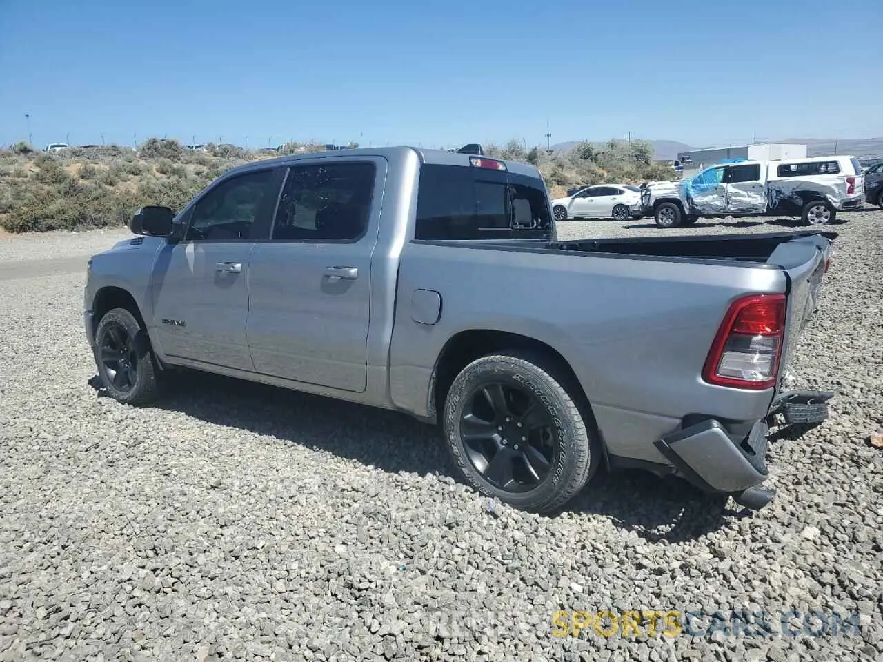 2 fotografías del automóvil dañado 1C6SRFFTXMN537235 RAM 1500 2021