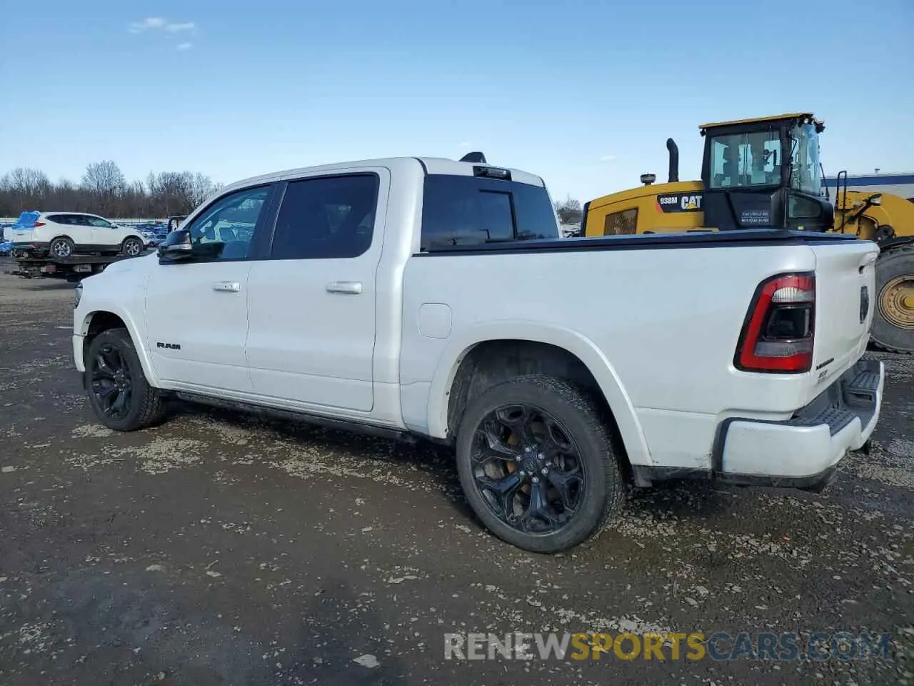 2 fotografías del automóvil dañado 1C6SRFHT9MN812994 RAM 1500 2021
