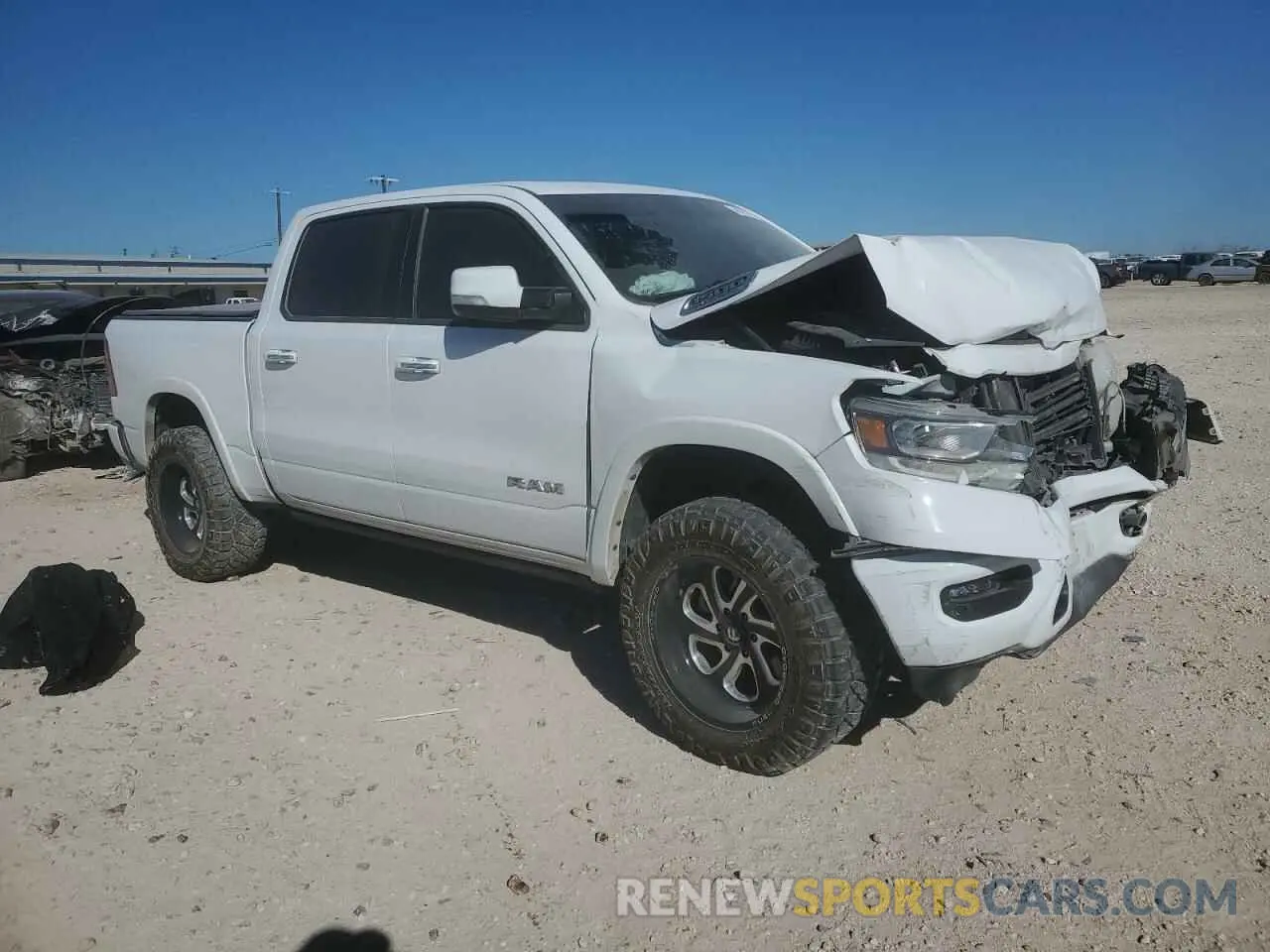 4 fotografías del automóvil dañado 1C6SRFJT5MN823307 RAM 1500 2021